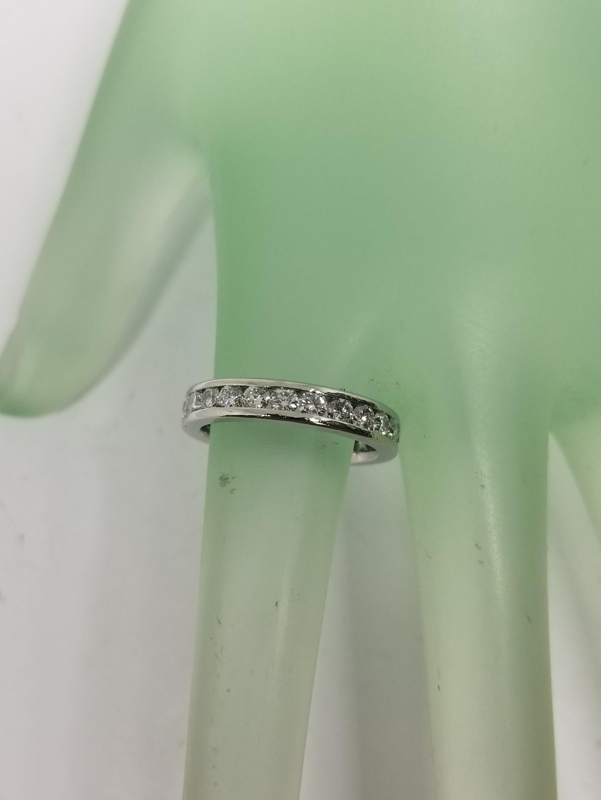 Contemporary Platinum Diamond Channel Set Eternity Ring For Sale