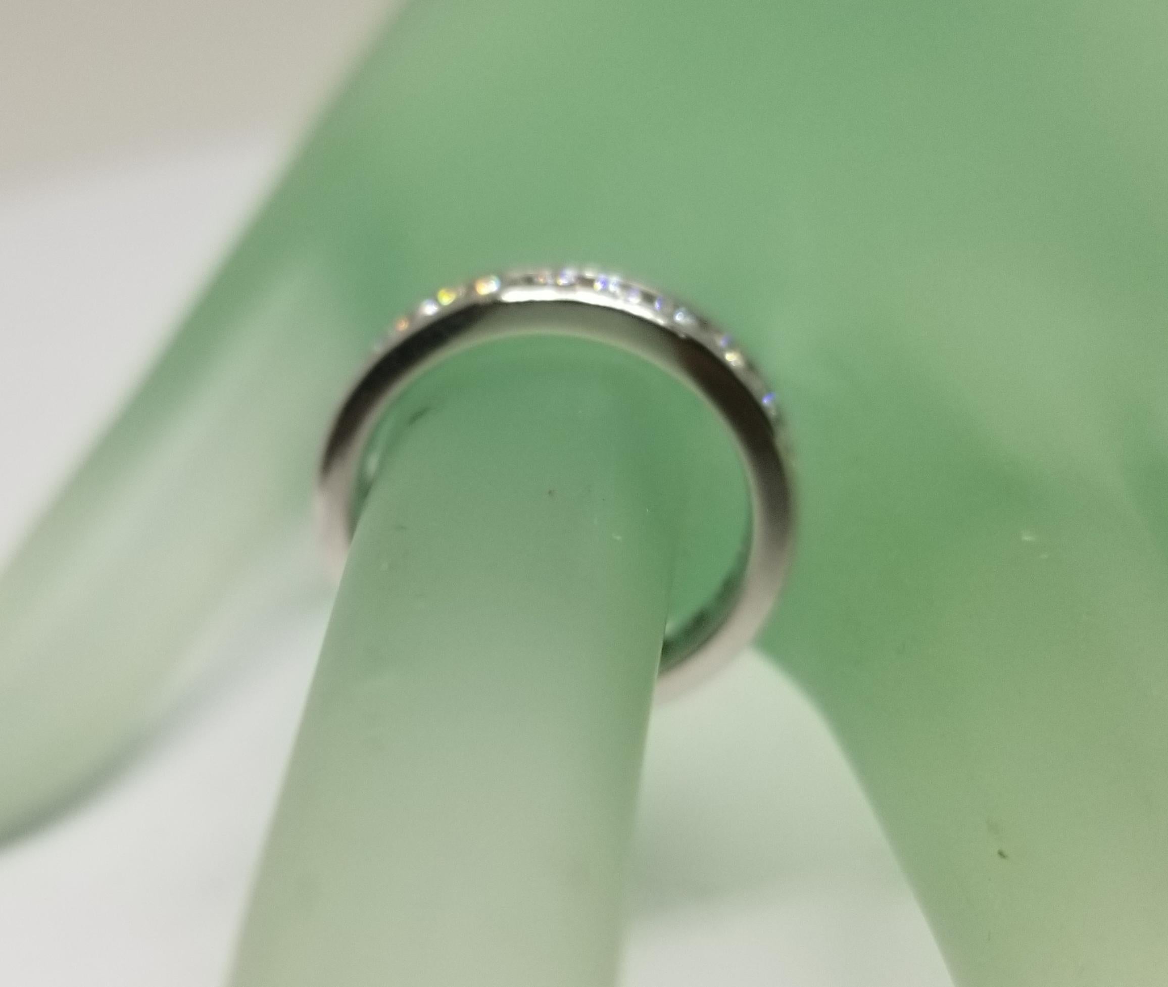 Round Cut Platinum Diamond Channel Set Eternity Ring For Sale