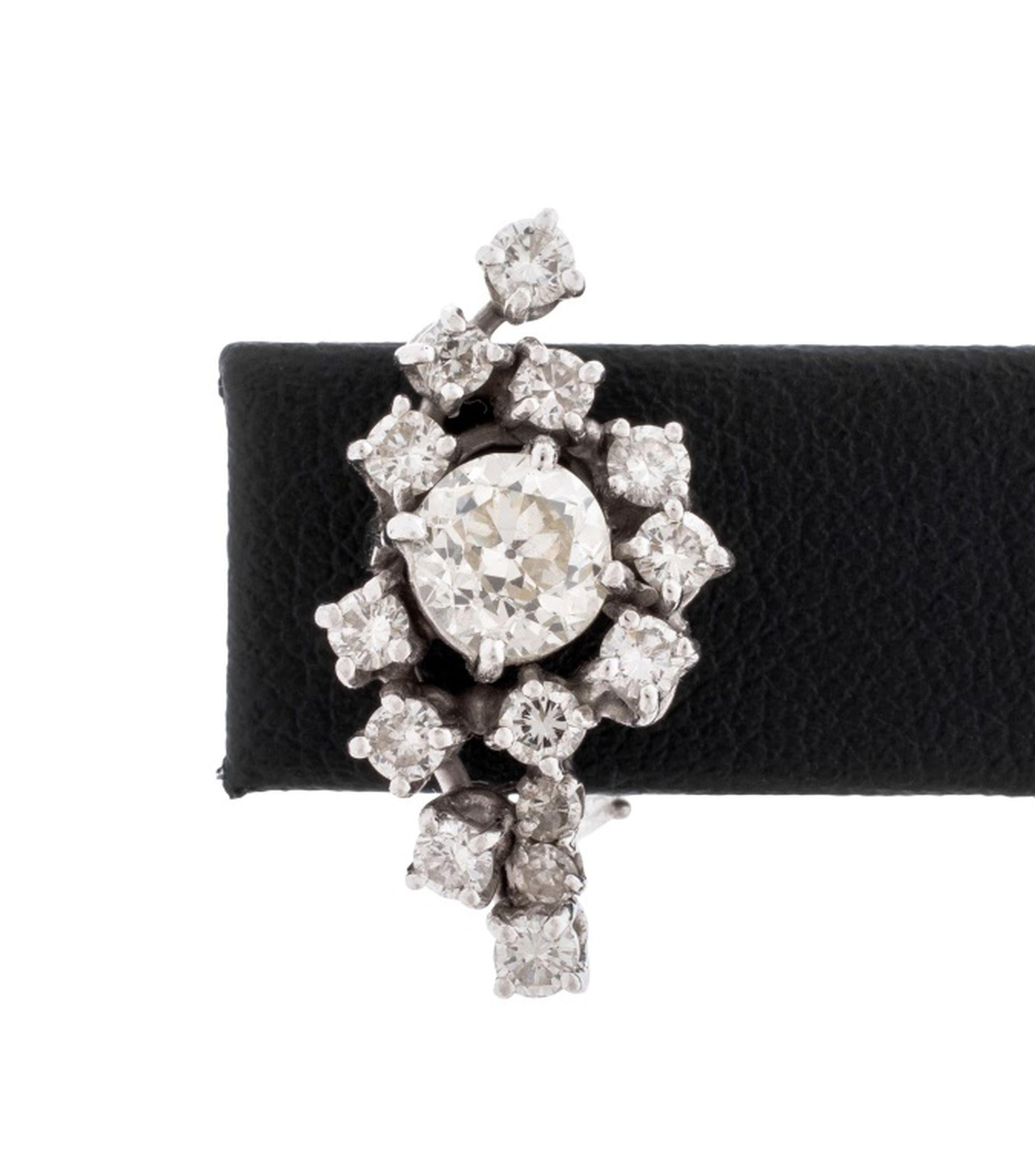 Pair of Platinum Diamond Cluster Earrings, adorned with two centered centered round faceted diamonds, weighing a total of approx. 1.85 carats, I-K color VS-SI clarity, further adorned with 28 prong set round faceted diamonds weighing a total of