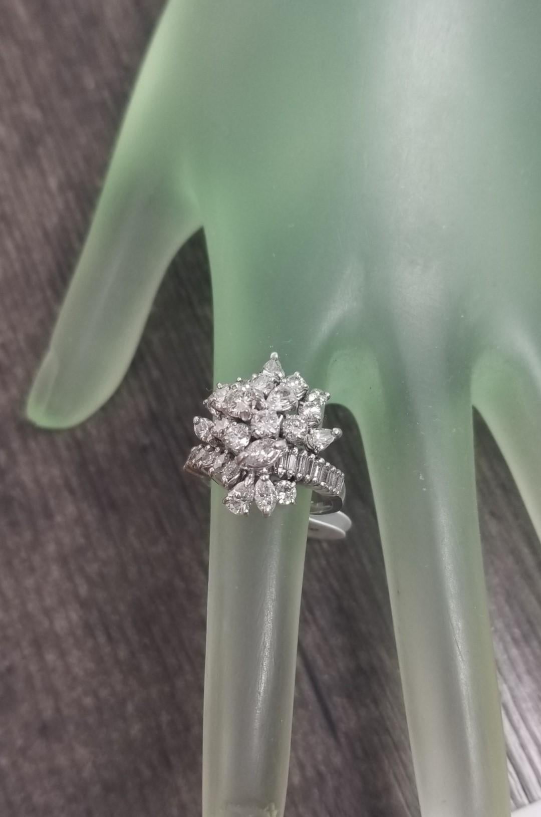 Platinum Diamond Cluster Ring w/ Marquise, Pear, Round and Baguette Cut Diamonds In Excellent Condition For Sale In Los Angeles, CA