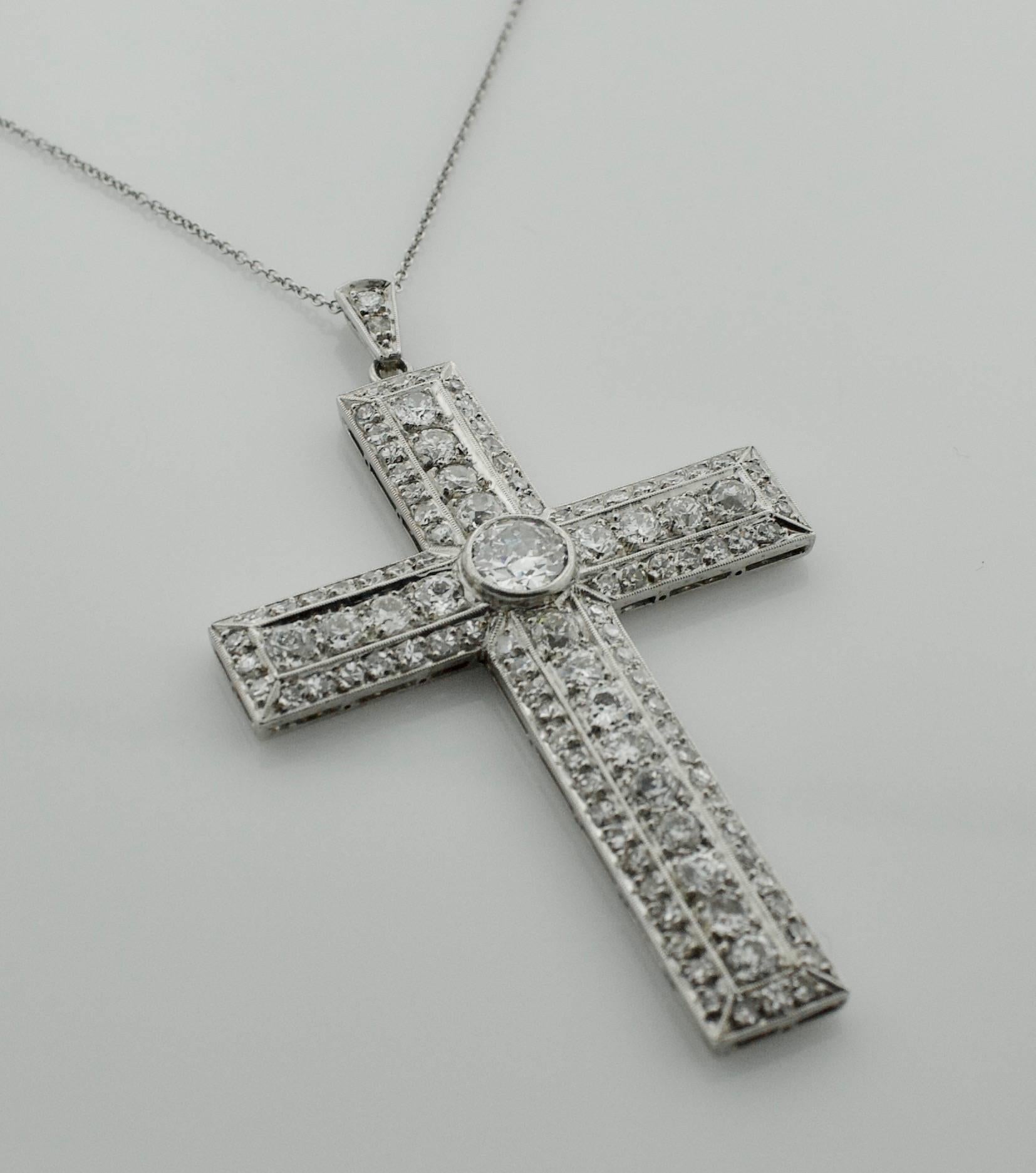 Platinum Diamond Cross Necklace Circa 1930's 5.00 carats. 
.90 Old European cut Diamond weighing .90 GH SI1 approximately 
One Hundred and Two Old European cut and round Diamonds weighing 4..10 carats approximately GH VS2 - SI1
Hanging from a simple