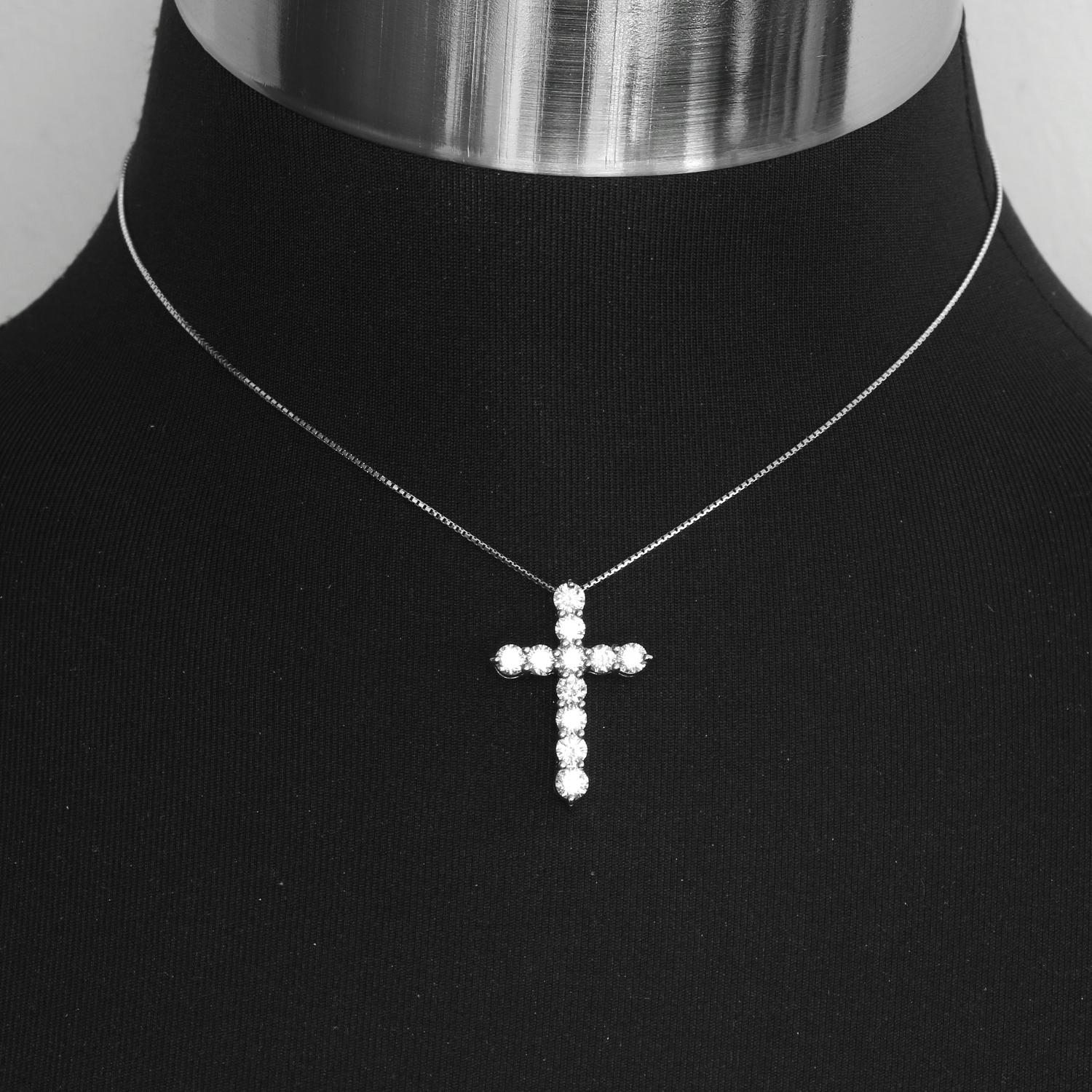 Platinum Diamond Cross Pendant Necklace -  18k white gold necklace with a Platinum cross pendant. Platinum cross pendant diamond weighing 2 carats. Pendant measures apx. 1 inch. Chain measures apx. 15 inches in length.  H-I in color and VS2 in