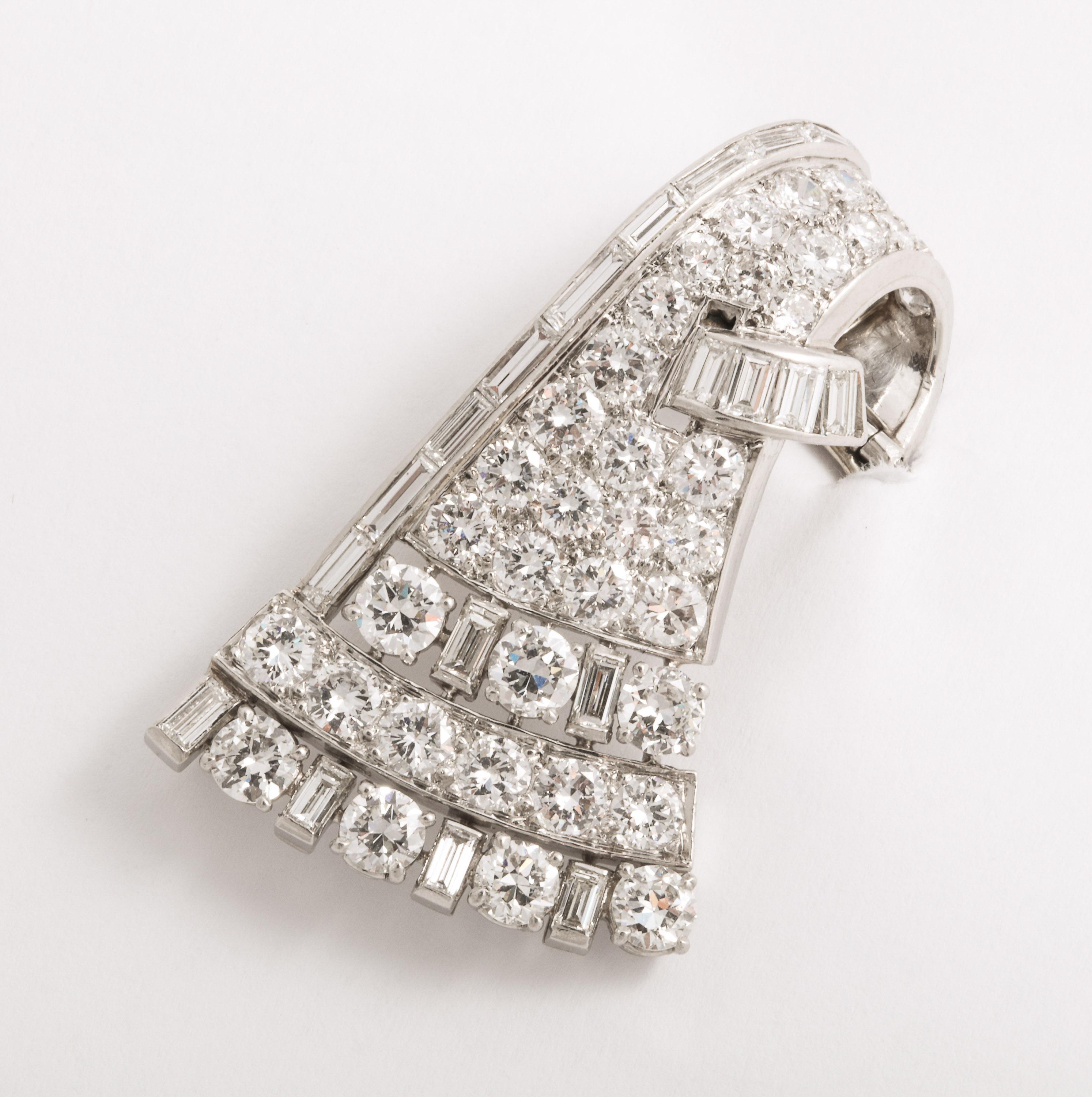 One half of an Art Deco connecting Diamond Clips - now separated and being sold as a single.  Can be mounted and worn as a Drop on a chain or worn as a clip on a jacket shoulder for a sleeve.  Very high style.  Approx 6 carats of very fine - full
