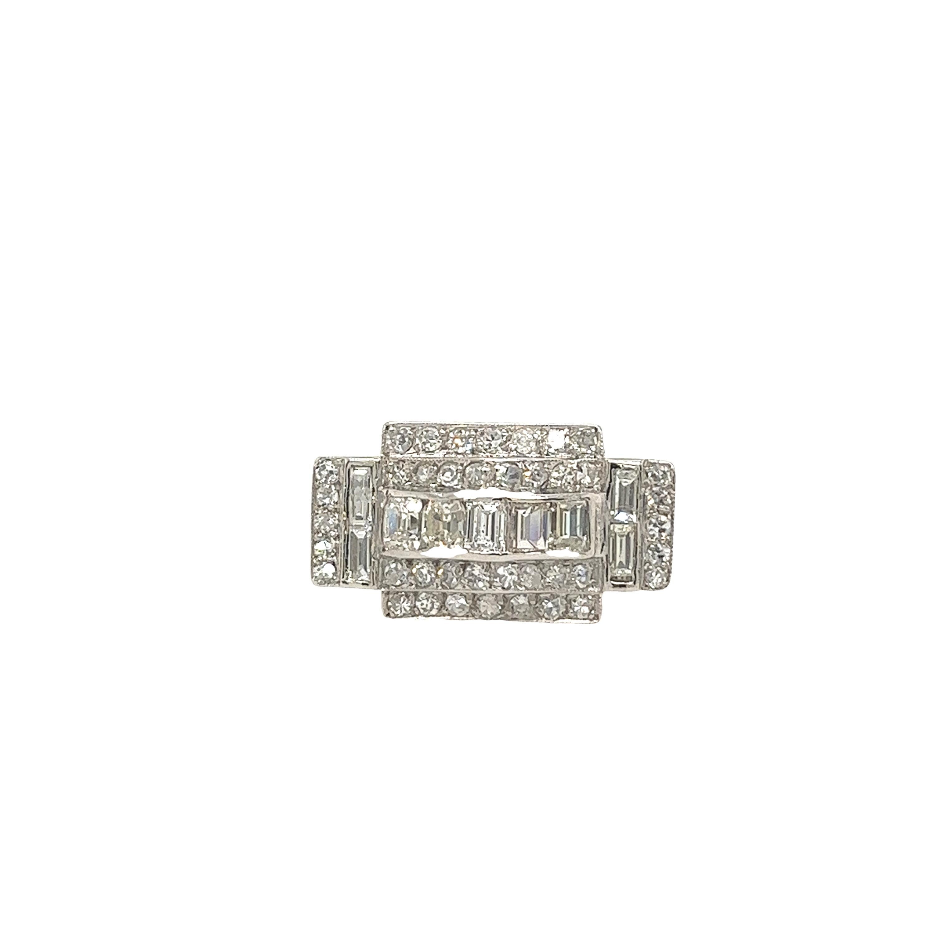An elegant and unique diamond dress ring set with 5 emerald cut diamonds, 4 baguettes and 40 round brilliant cut natural diamonds, with a total diamond weight of 1.30ct in a platinum setting.

Total Diamond Weight: 1.30ct
Diamond Colour: G/H
Diamond