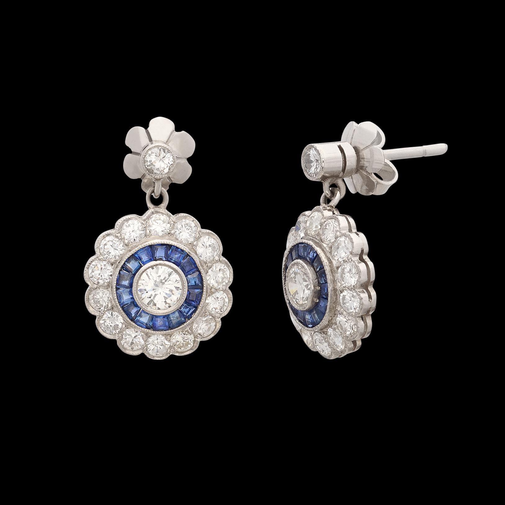 Round Cut Platinum Diamond Drop Earrings with Sapphire Halo For Sale
