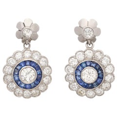 Platinum Diamond Drop Earrings with Sapphire Halo