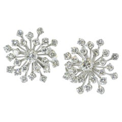 Platinum & Diamond Earrings with  4.3 cts in a  Star Burst Design.