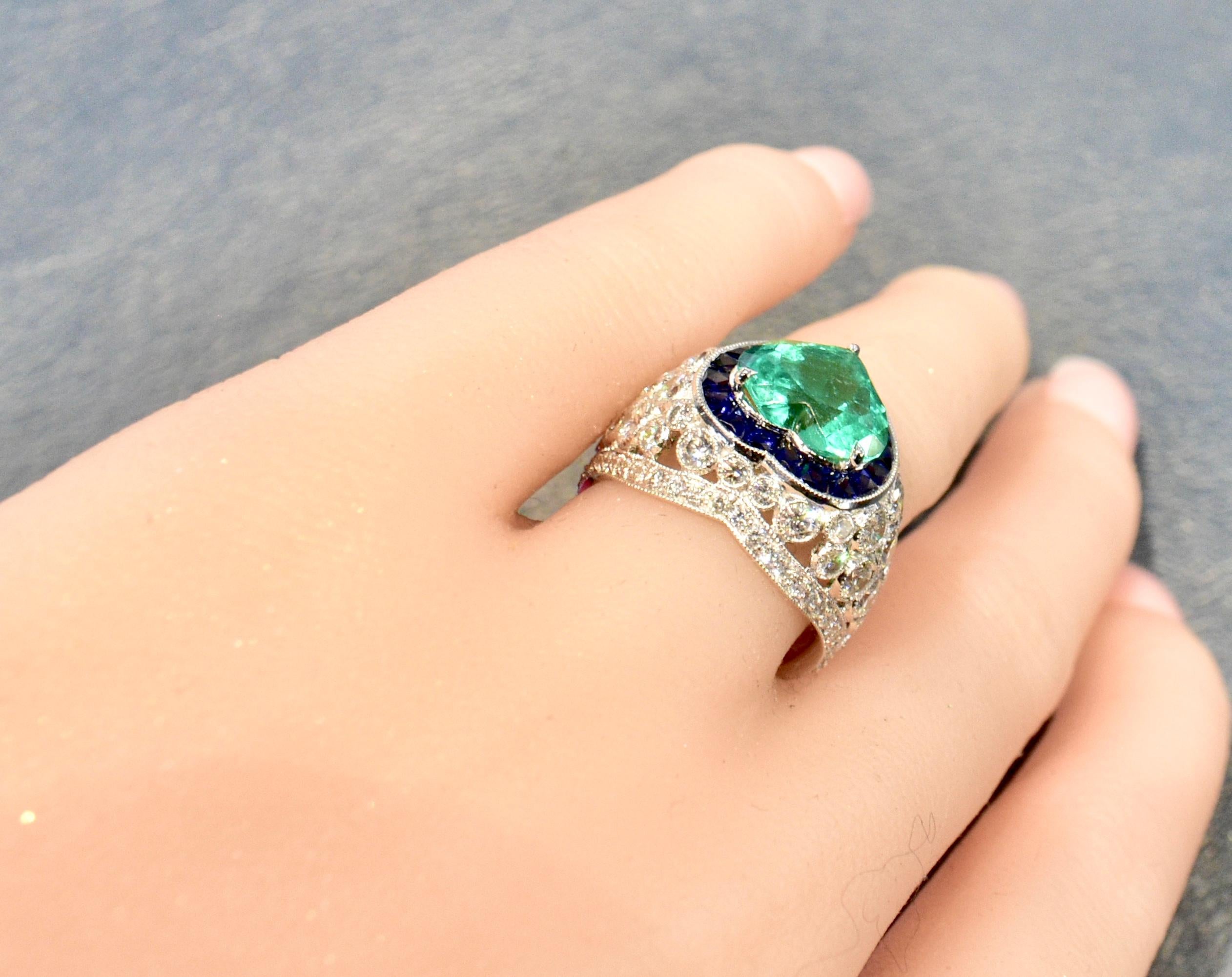 Platinum, Diamond, Emerald and Sapphire Ring 8