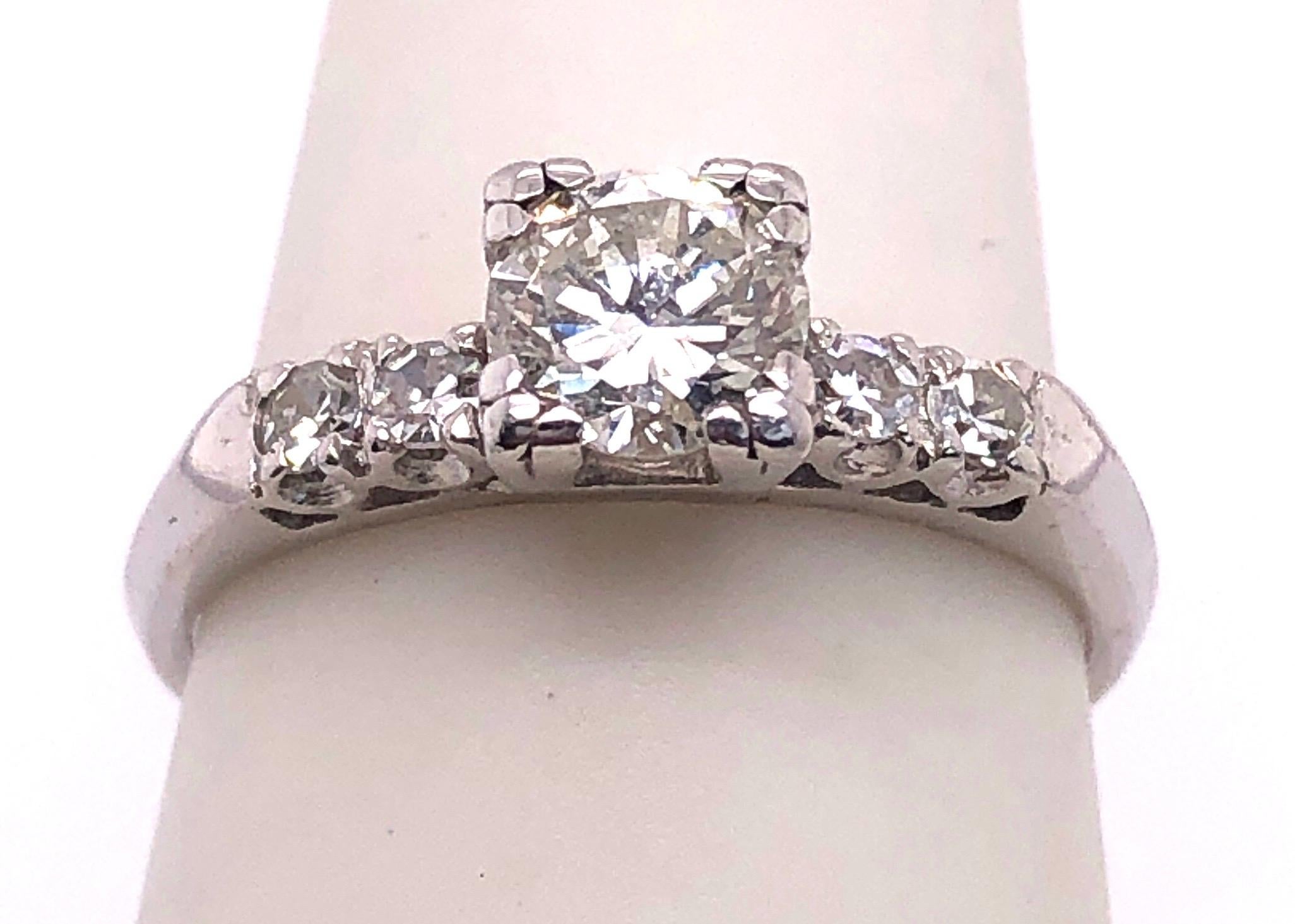 Platinum Diamond Engagement Ring 0.85 Total Diamond Weight.
Size 6.25
3.28 grams total weight.