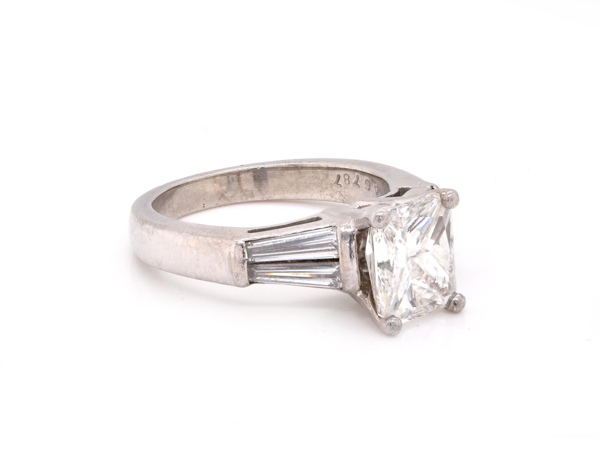 Material: platinum
Center Diamond: 1 radiant cut = 2.25ct
Color: I
Clarity: VS2
Diamond: 4 baguette cut = .50cttw
Color: I
Clarity: VS2
Ring Size: 5 (please allow up to 2 additional business days for sizing requests)
Dimensions: ring shank measures