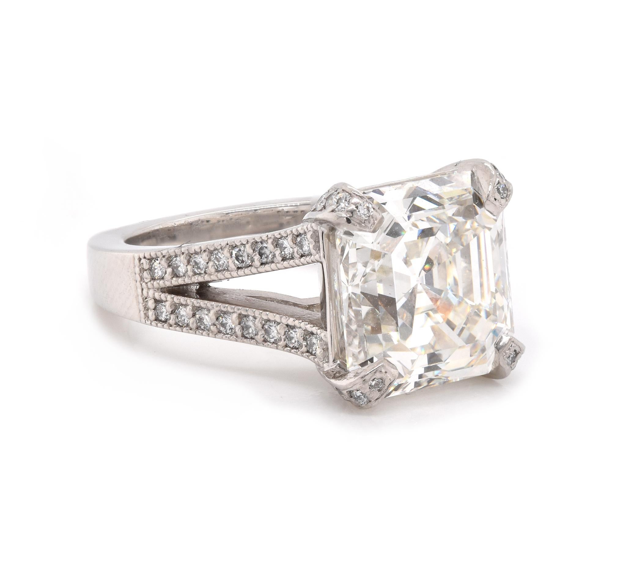 Designer: custom
Material: Platinum
Center Diamond: 1 square emerald cut = 7.52ct
Color: J
Clarity: VS2
GIA: 215623507
Diamond: 32 round cut = .32cttw
Color: H
Clarity: VS1
Ring Size: 6.5 (please allow up to 2 additional business days for sizing