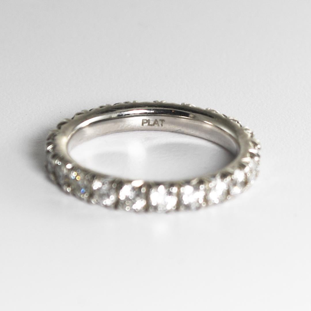 Platinum Diamond Eternity Band with 1.20tdw of round brilliant cuts.
Clarity ranges from SI1-SI2, color G-H.
Size 4 1/2, weighs 3.9 grams.