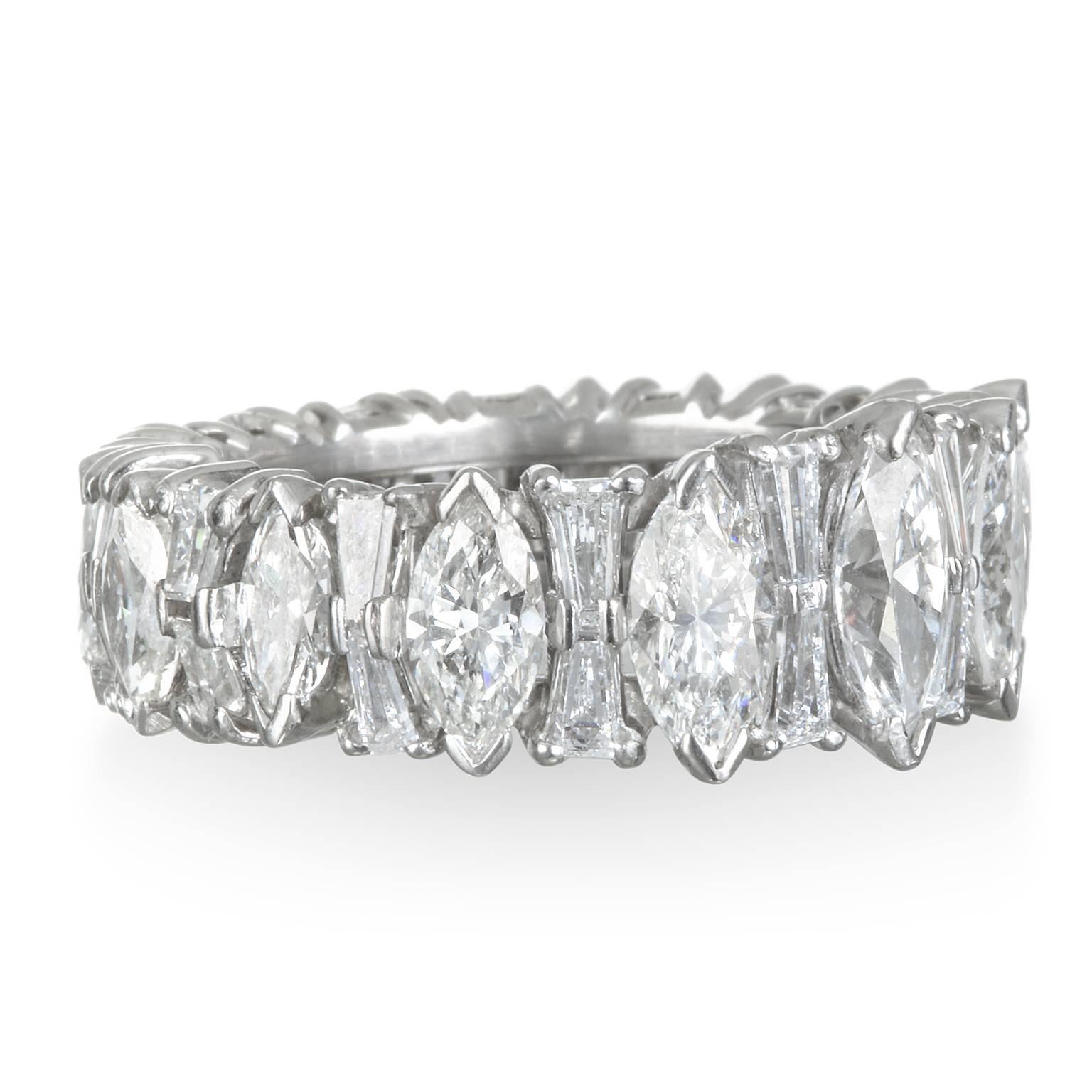 A statement piece! Beautiful on its own or stack to create your very own style. Handcrafted in Platinum and slightly tapered for comfort, this elegant design transcends time.  Circa 1950's
Marquise diamonds - 14 stones weigh 5.0 carats. 
Tapered