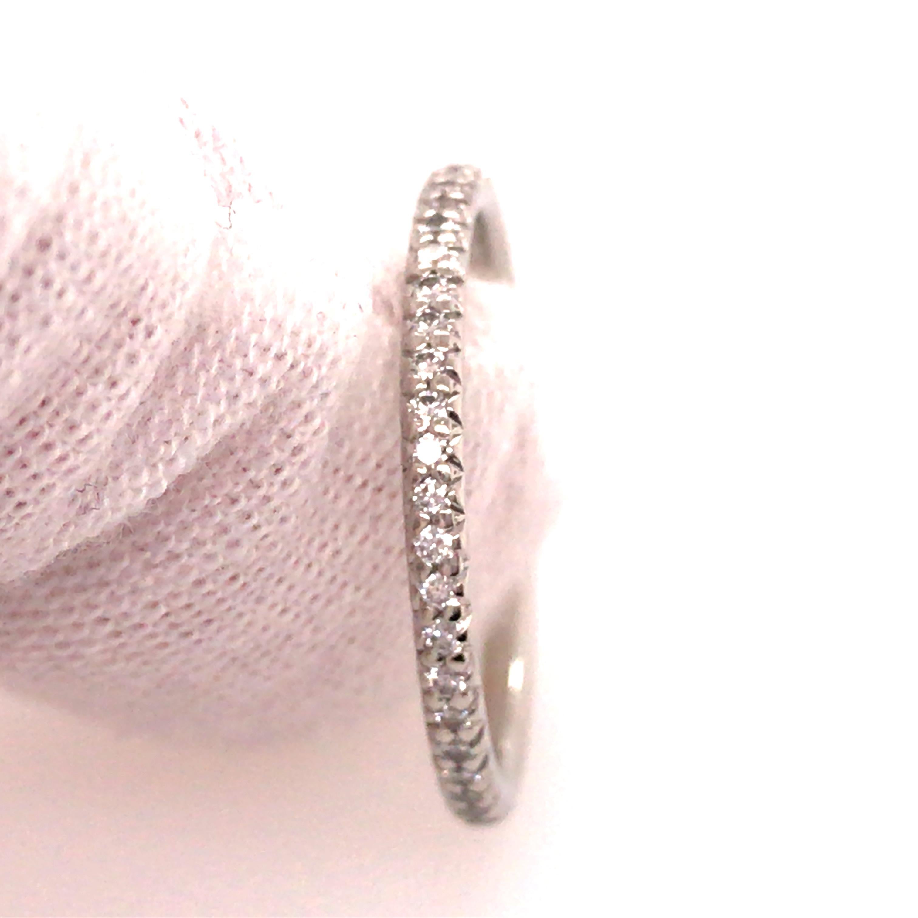 Platinum Diamond Eternity Band.  Expertly Prong set with Round Brilliant Cut Diamonds weighing .39 carat total weight G-H in color and VS in clarity.  The Ring measures 1/8 inch in width and weighs 2.79 grams. Ring size 7 1/2.