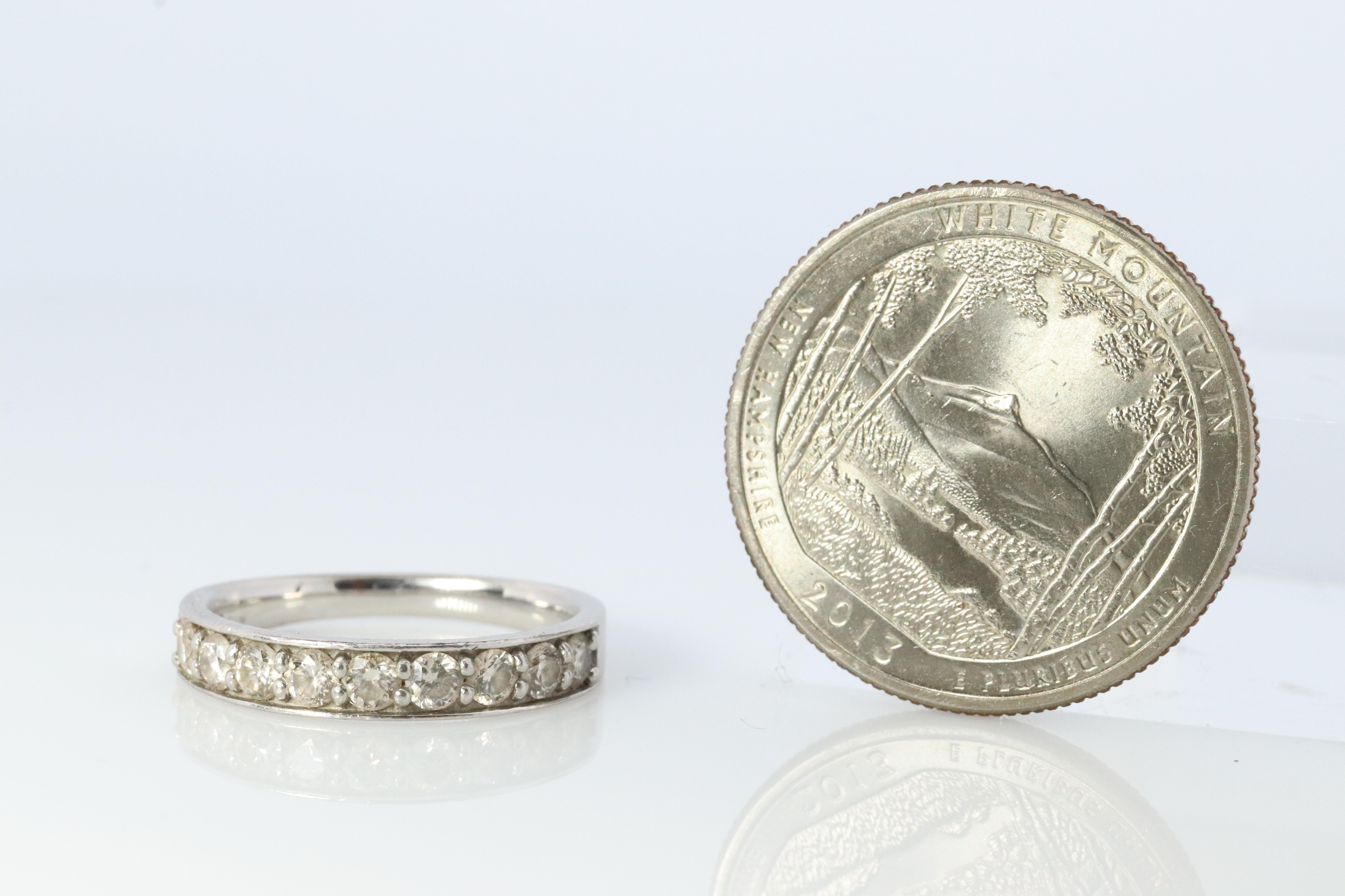 Round Cut Platinum Diamond eternity band. PT900 1/2ct Half Eternity Infinty Ring. For Sale