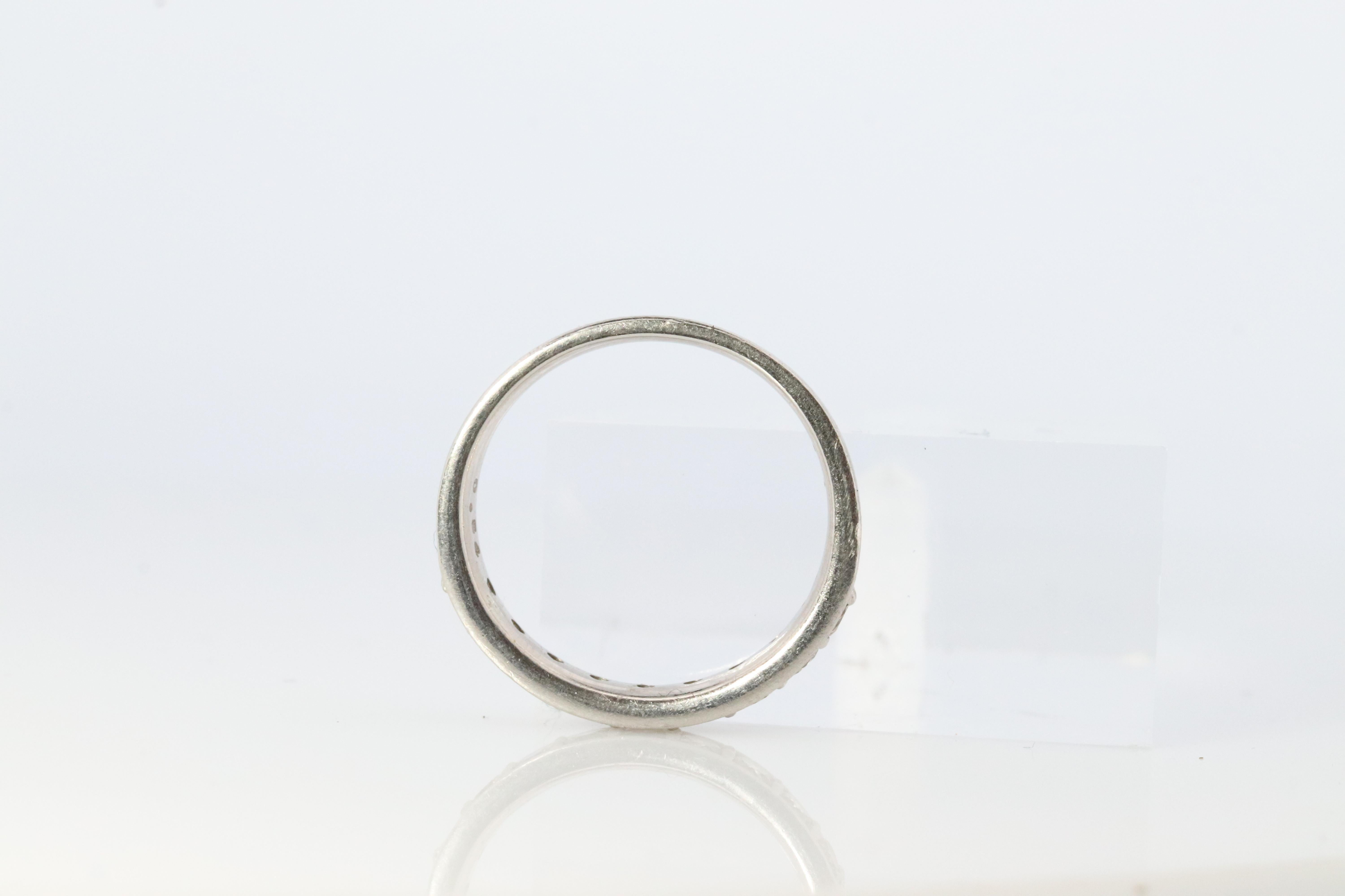 Platinum Diamond eternity band. PT900 1/2ct Half Eternity Infinty Ring. In Good Condition For Sale In Port Charlotte, FL