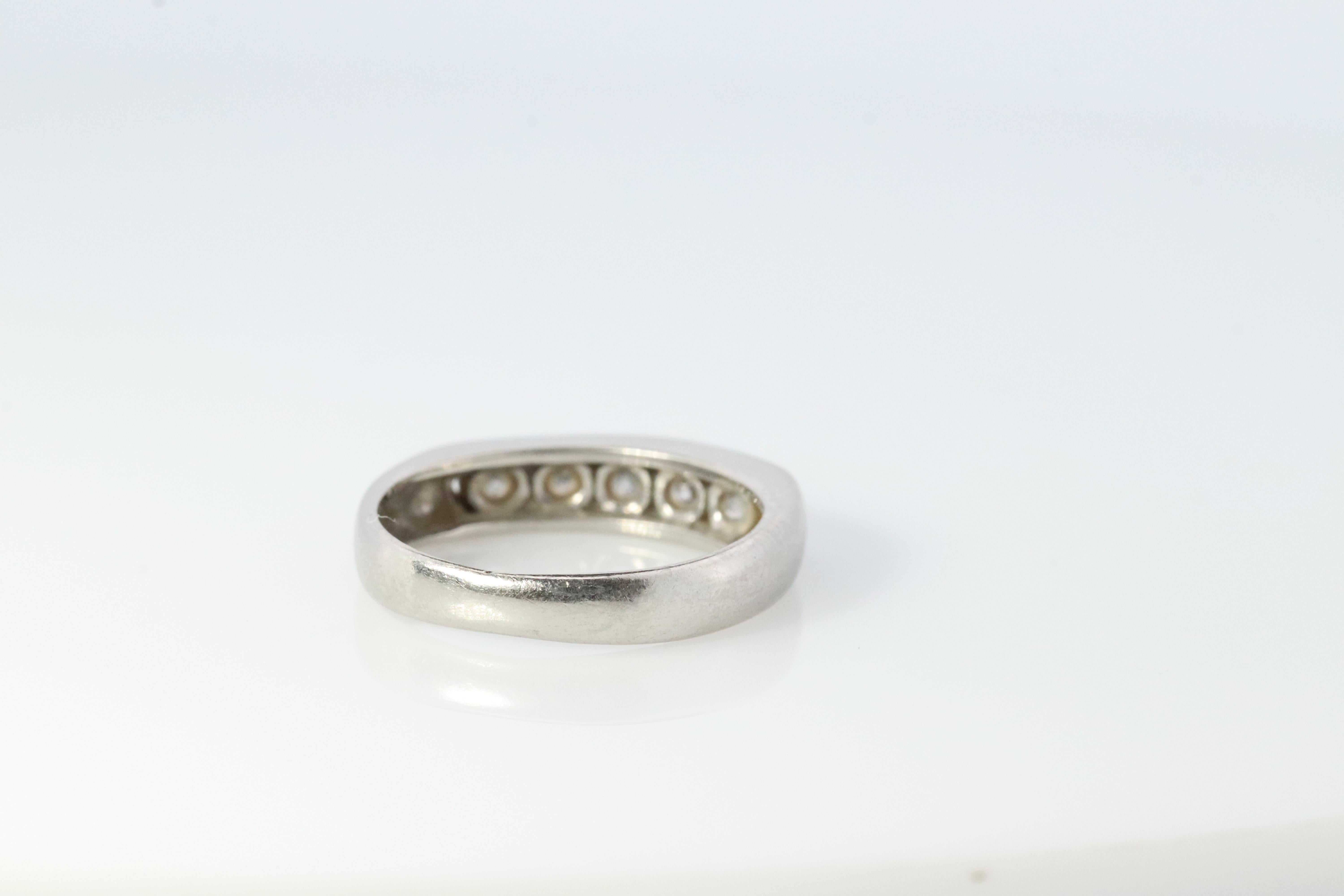 Modern Platinum Diamond eternity band. PT900 1/2ctw Half Anniversary Infinity Ring For Sale