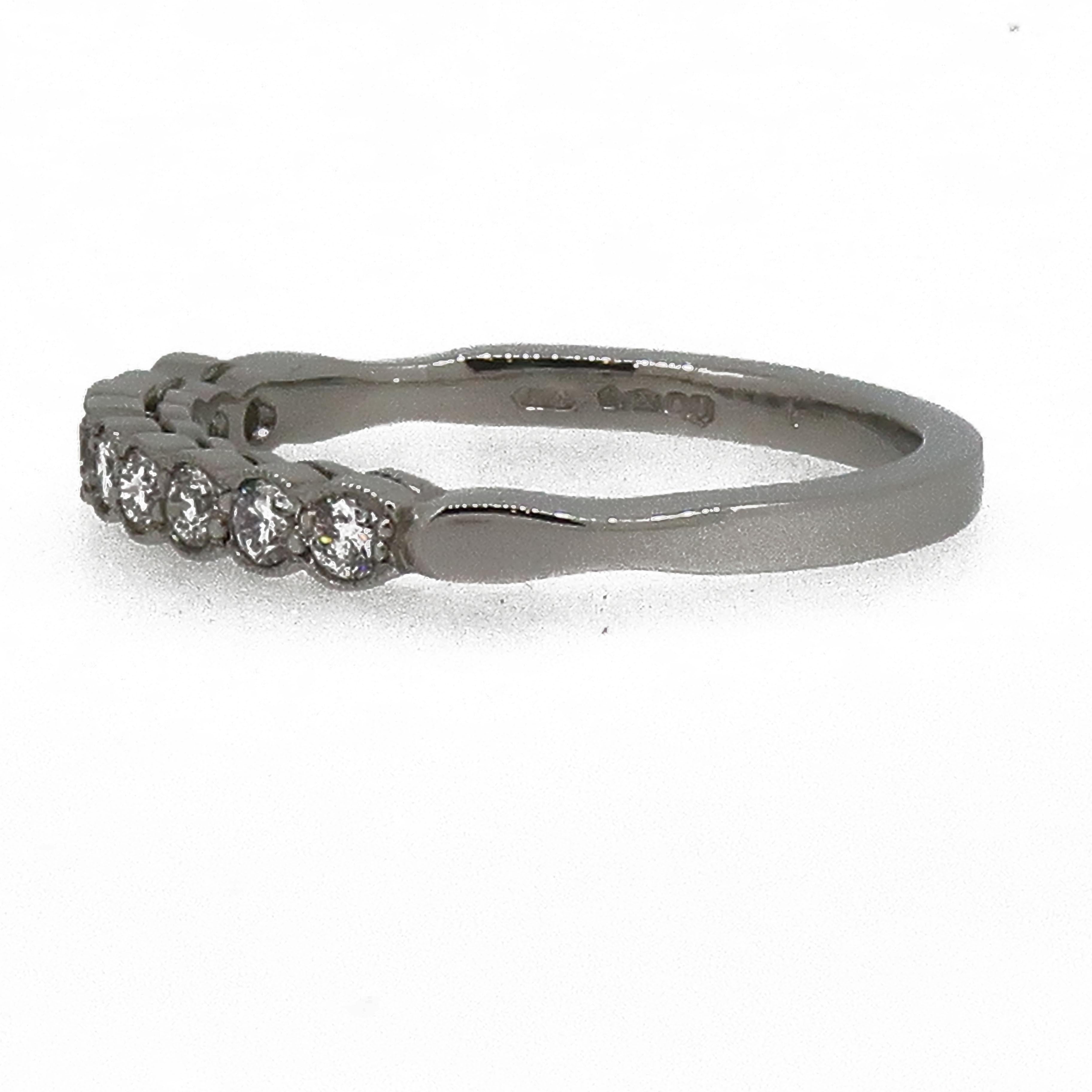 Platinum Diamond Eternity Band Ring

A dainty diamond eternity ring. Consisting of nine white brilliant cut diamonds, weighing 0.30ct in total. Set in a delicate platinum mill-grain setting. It would make the perfect wedding band as its so pretty