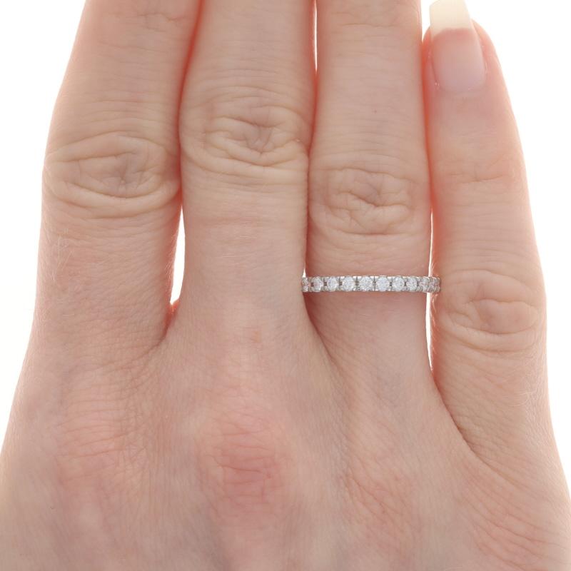 Size: 6 1/2
Sizing Fee: Up 2 sizes for $40 or Down 1 size for $30

Metal Content: Platinum

Stone Information

Natural Diamonds
Carat(s): .41ctw
Cut: Round Brilliant
Color: F - G
Clarity: VS1 - VS2

Total Carats: .41ctw

Style: Wedding Band with