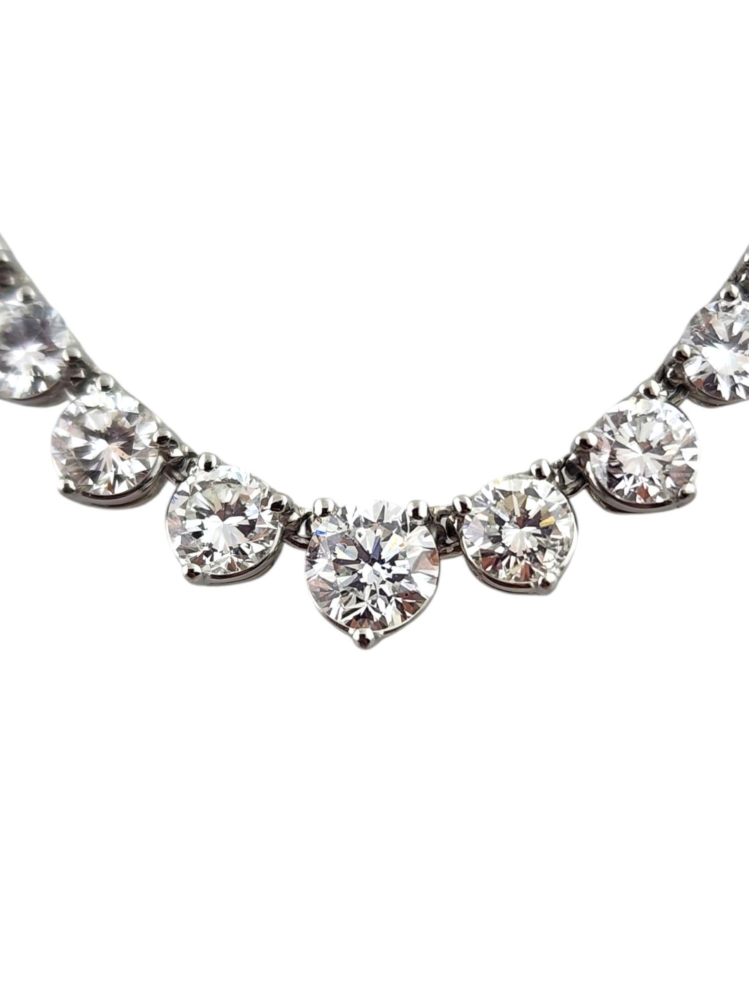 Platinum Diamond Graduated Tennis Necklace

This stunning graduated tennis necklace features 105 sparkling round brilliant cut diamonds that will make your look pop!

Approximate total diamond weight: 10.03 cts

Diamond color: G-H

Diamond clarity: