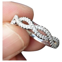 Platinum Diamond Infinity Twist Band – 0.12–0.15ct Total, Size 6.5