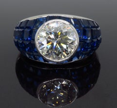 Platinum Diamond and Invisible Set Blue Sapphire Ring