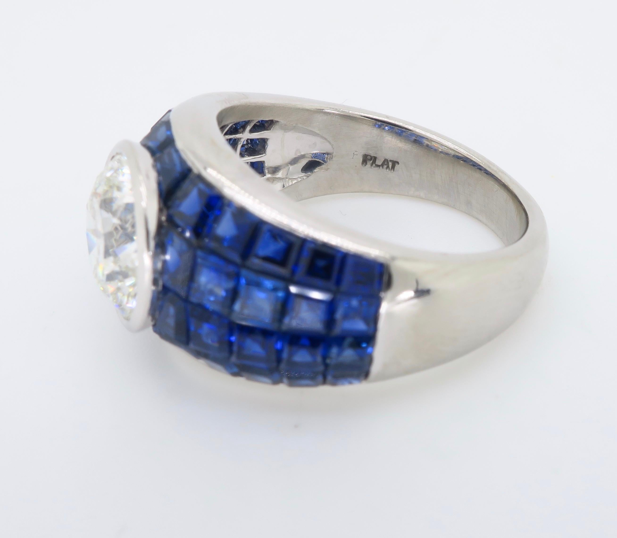 Women's or Men's Platinum Diamond and Invisible Set Blue Sapphire Ring For Sale