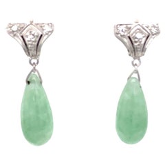 Boucles d
oreilles pendantes Art Déco en platine, diamant et jadéite