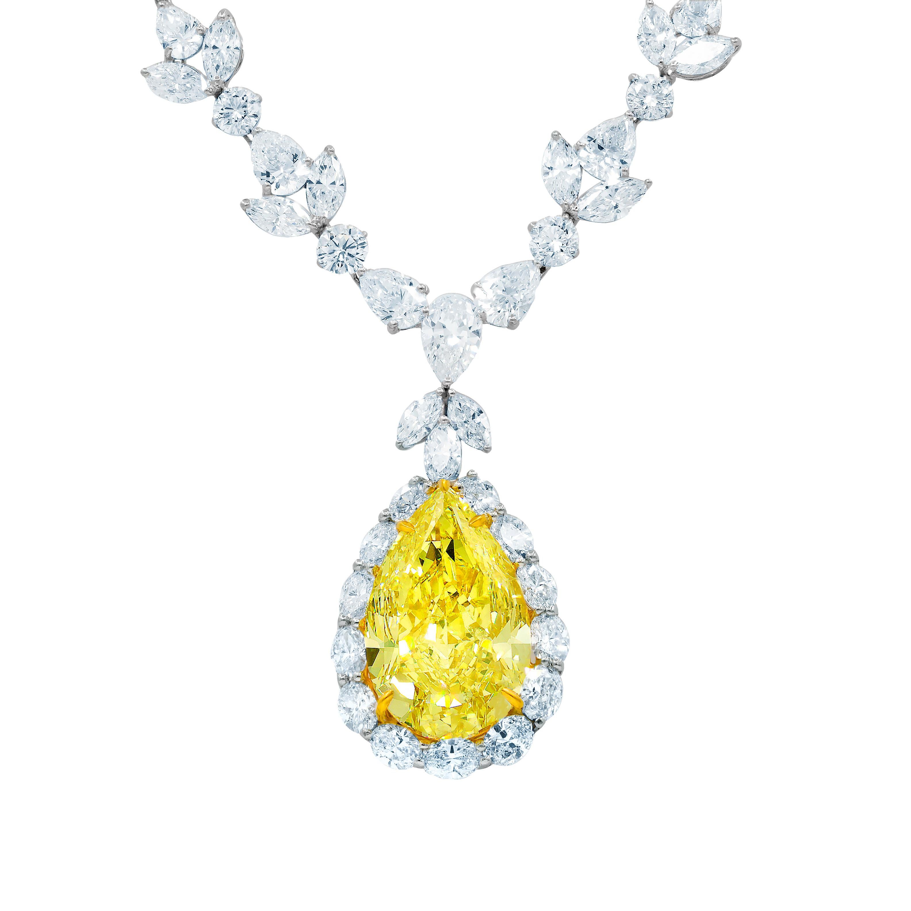 Platinum diamond necklace with GIA certified center 35.31 fancy intense vivd yellow vs2 pear shape, GIA#2145952743 set in platinum handmade necklace, features 47.00ct of outside diamonds D/E/F VVS-VS quality. Plus  center 1.50ct pear e vs1