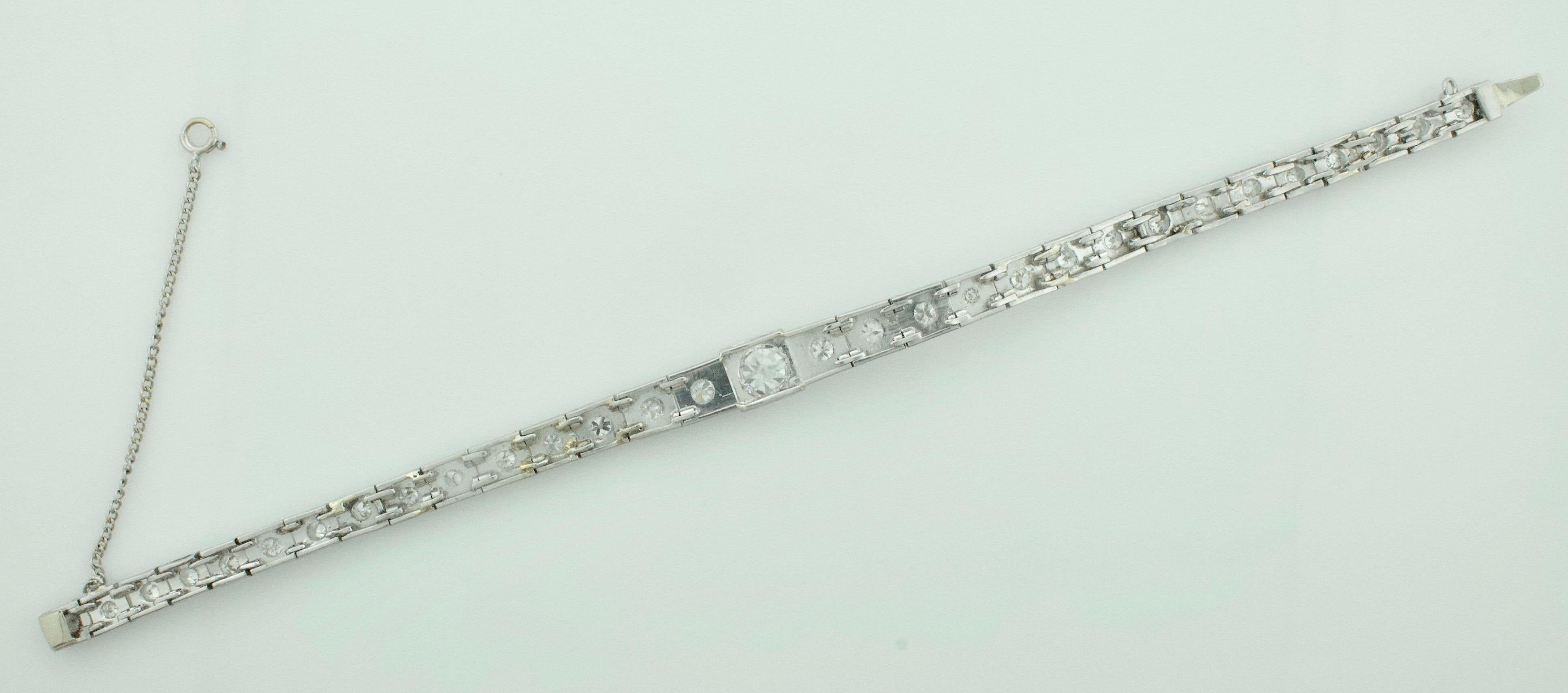 Platinum Diamond  One Carat Center Tennis Bracelet Circa 1940's 3.40 Carats
One Old European Cut Diamonds Weighing 1.00 Carats Approximately [G-SI2]
Thirty Round Cut Diamonds Weighing 2.40 Carats Approximately [GH SI]
[bright with no imperfections