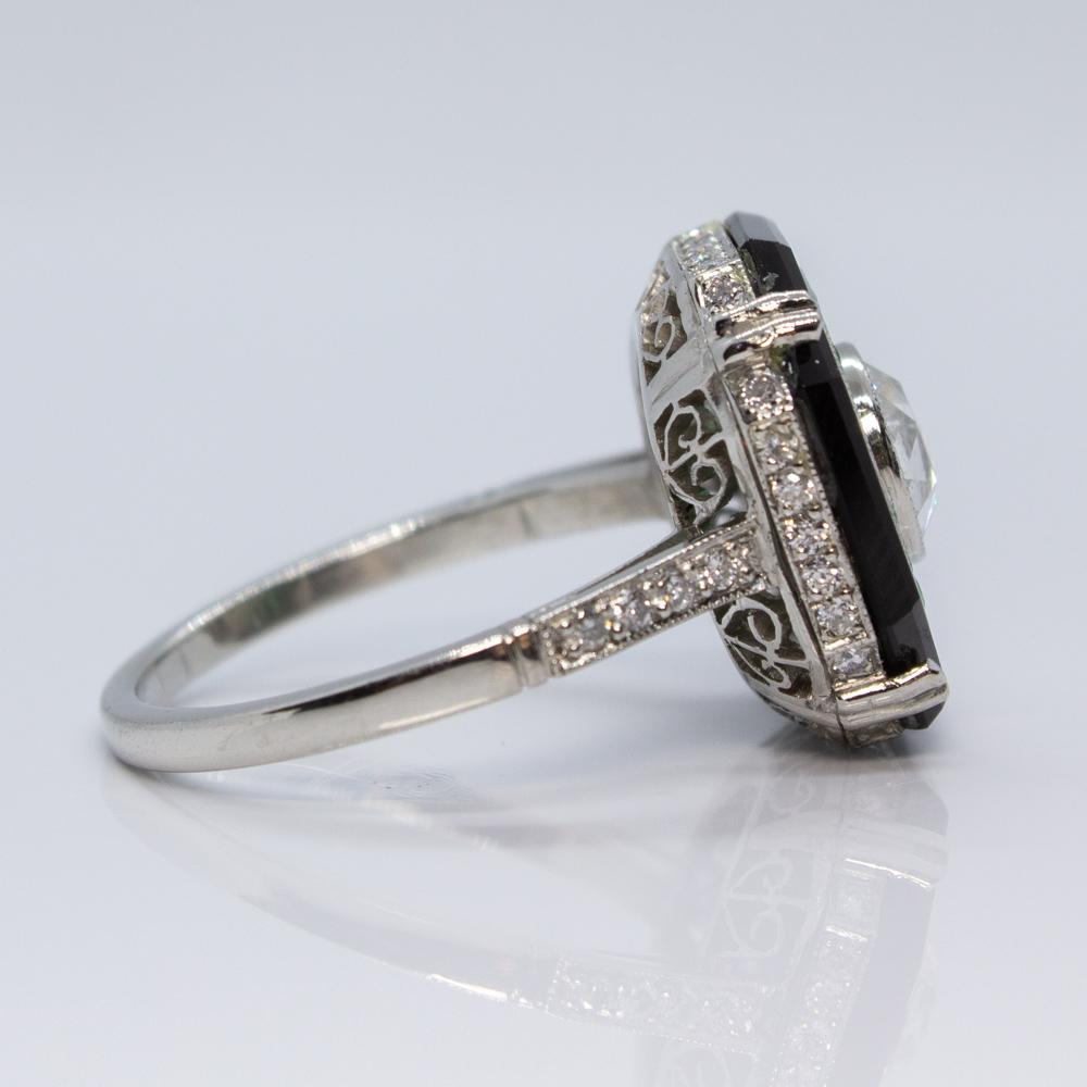Old European Cut Platinum Diamond, Onyx and Emerald Ring