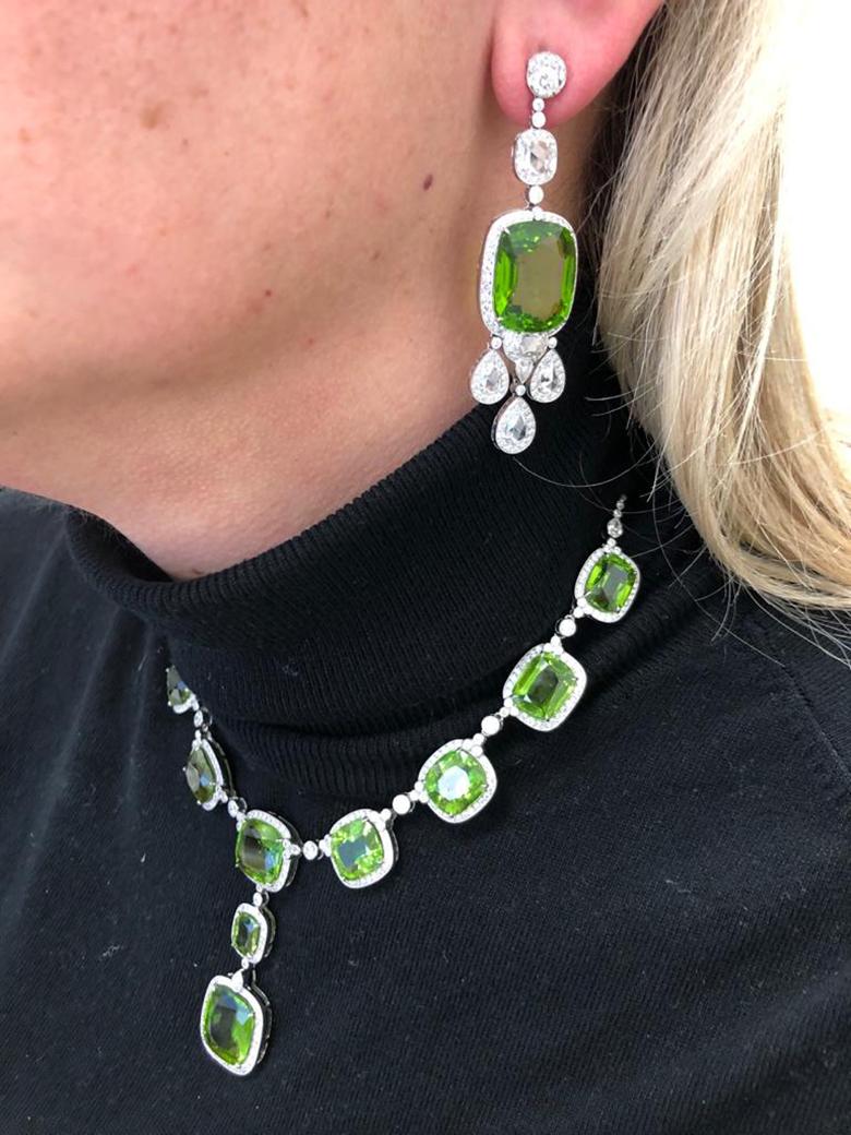 Round Cut Platinum Diamond, Peridot Necklace and Earrings For Sale