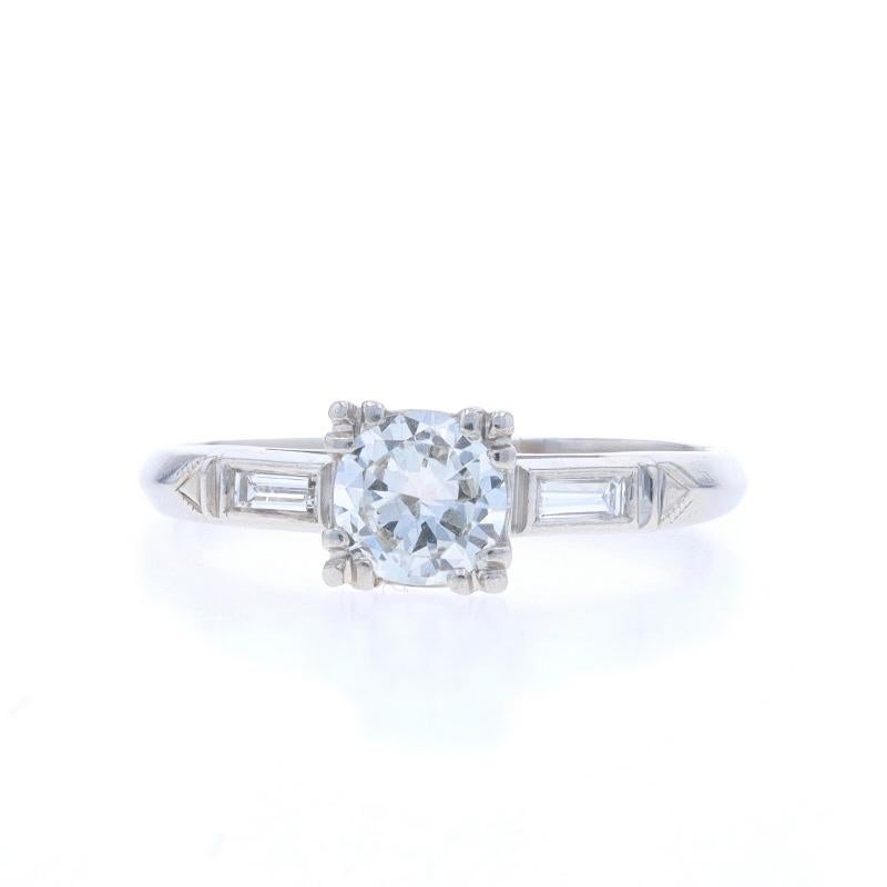 Size: 7

Era: Retro
Date: 1940s - 1950s

Metal Content: Platinum

Stone Information

Natural Diamond
Carat(s): .55ct
Cut: Transitional Round Brilliant
Color: H
Clarity: VS2

Natural Diamonds
Carat(s): .10ctw
Cut: Baguette
Color: G - H
Clarity: VS1 -