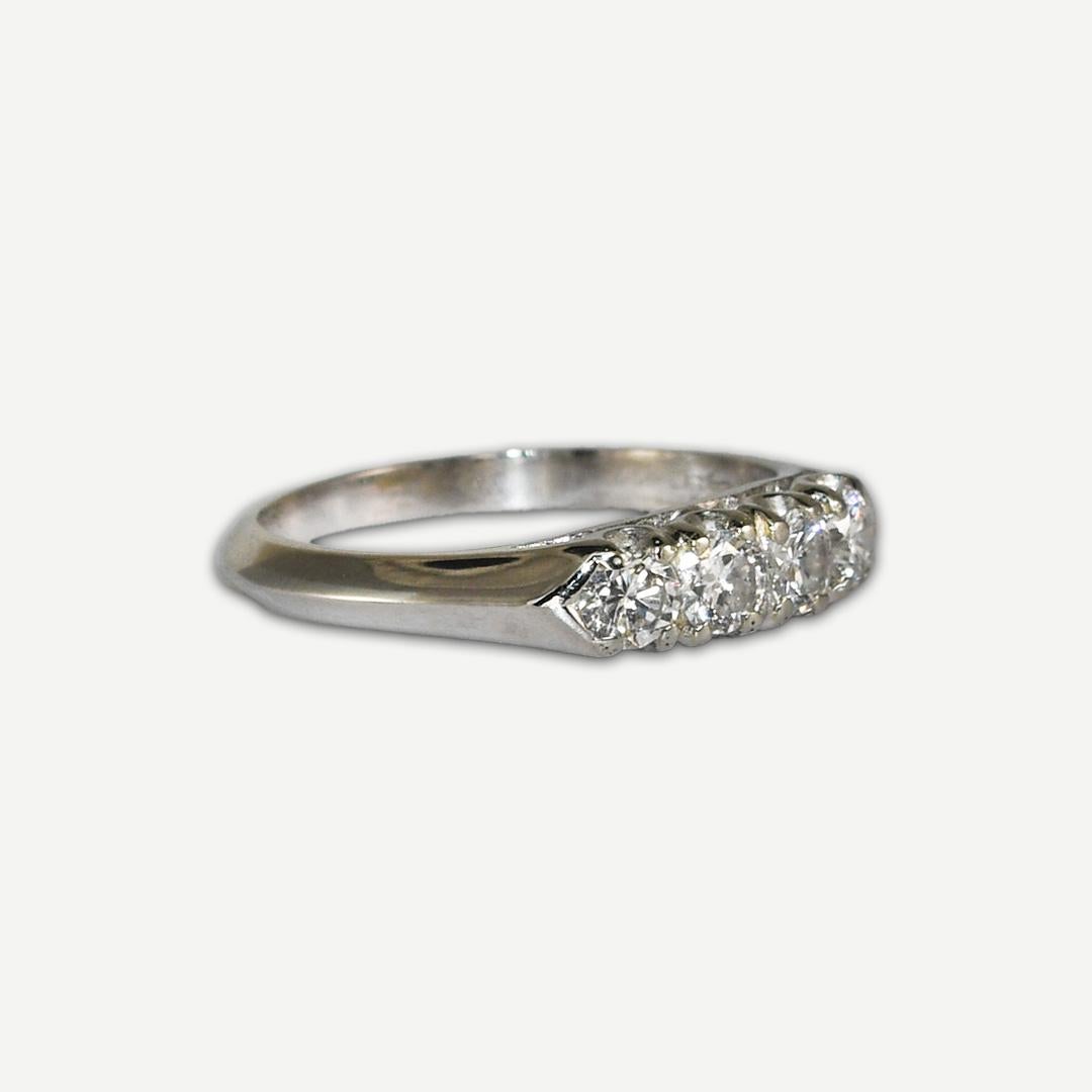 Ladies' platinum and diamond ring.
Stamped Plat and weighs 3.8 grams.
The diamonds are round brilliant cuts, h, i, j color range, Vs clarity, .50 total carats.
Ring size is 6 3/4 and can be sized, up or down, 3/4 of a size or less.
It just polished