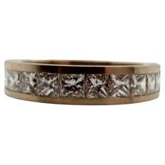 Anillo platino diamante chanel engastado diamantes talla princesa banda PT950