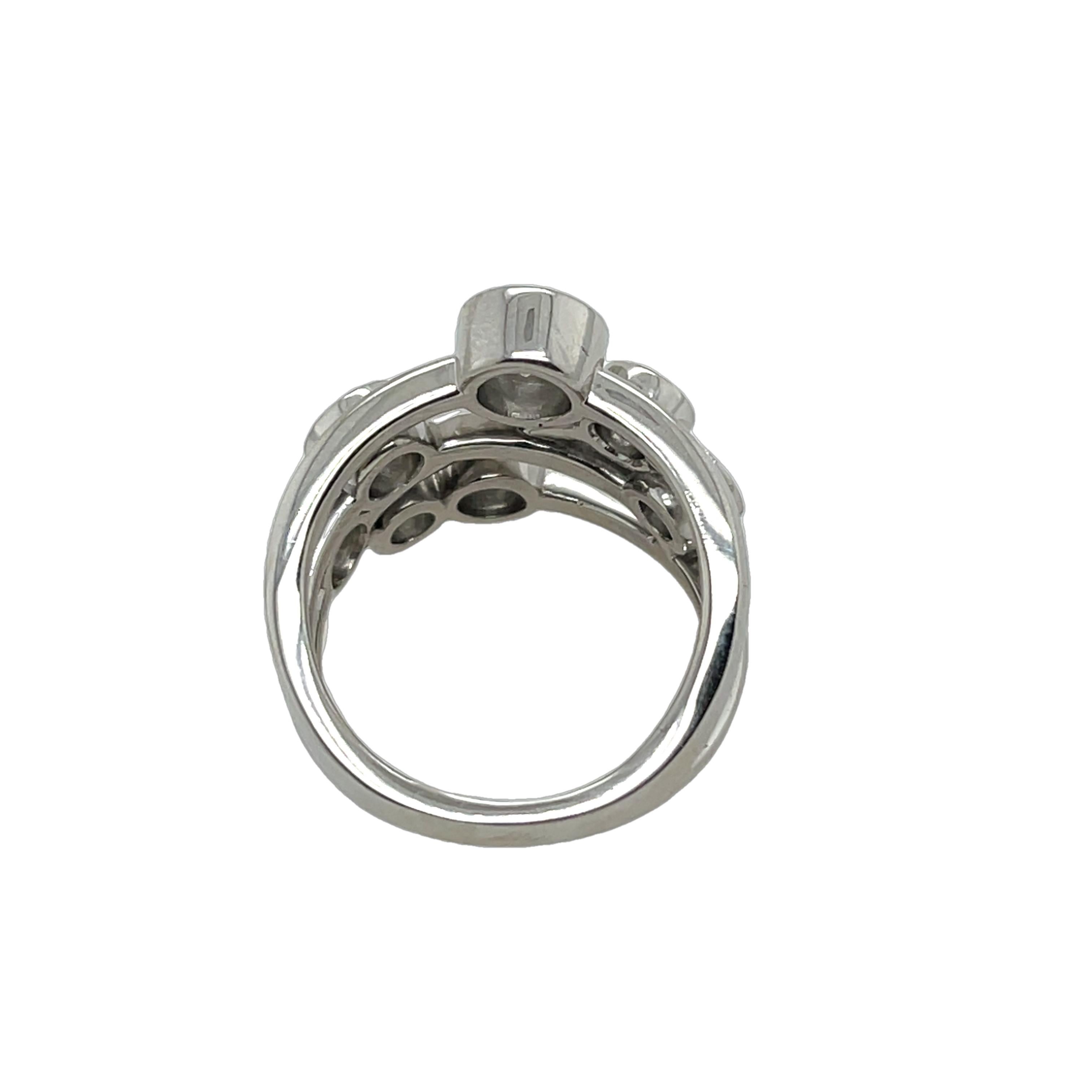 A stunning bubble-style ring crafted in platinum, 
set with seven round brilliant diamonds totaling 2.20ct. 
Two of the diamonds are GIA-certified, 
ensuring exceptional quality and brilliance. 
A timeless and elegant statement piece.

Total Diamond