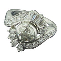 Retro Platinum Diamond Ring with a 1.00 Carat Center Round Cut Diamond