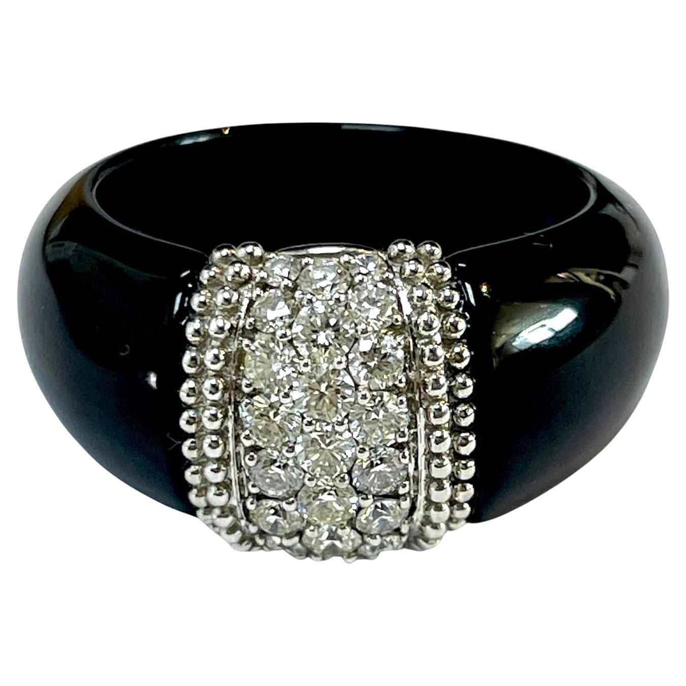 Anillo de diamantes en platino con banda de ónix negro en venta