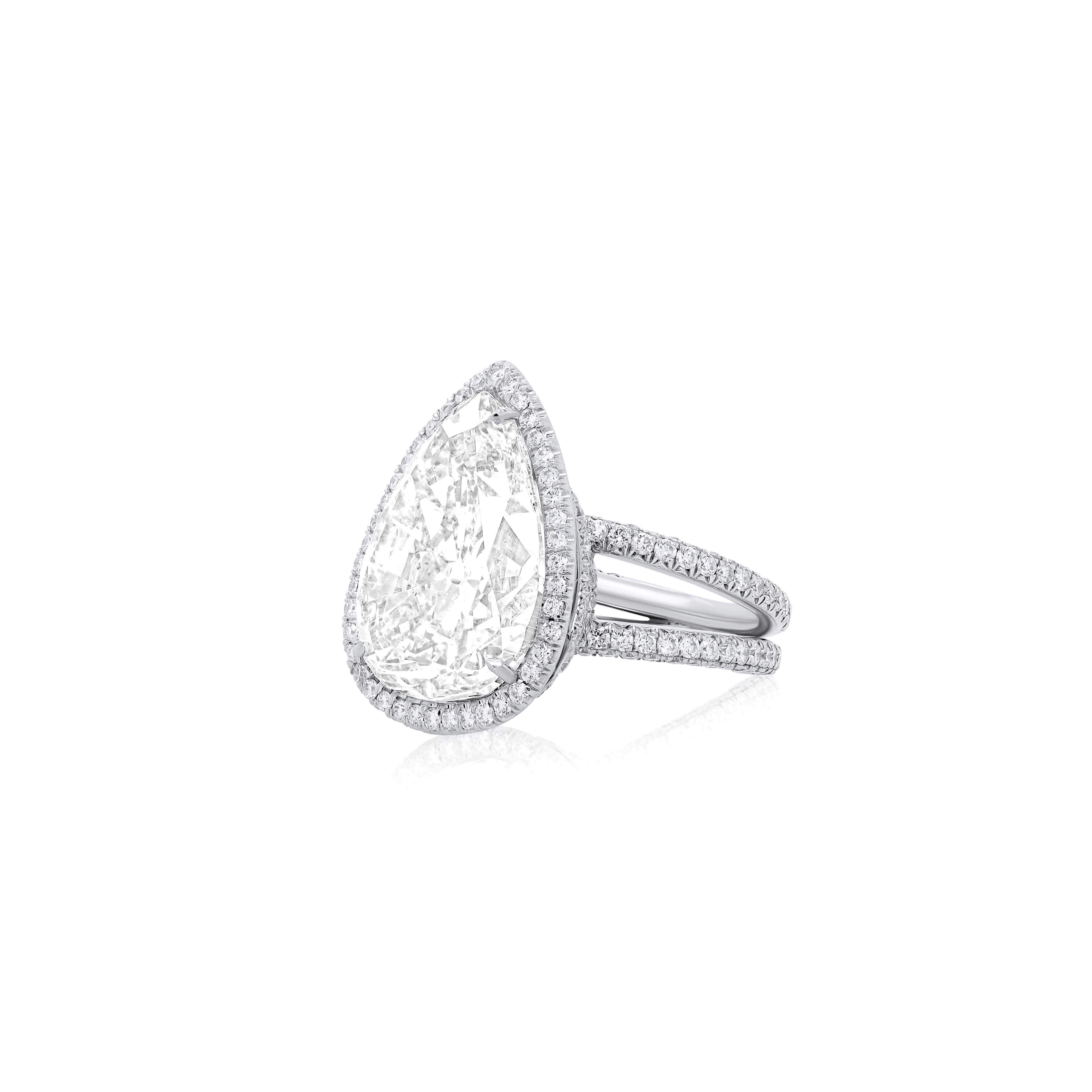 Pear Cut Platinum Diamond Ring with Pear Shape Diamond Center