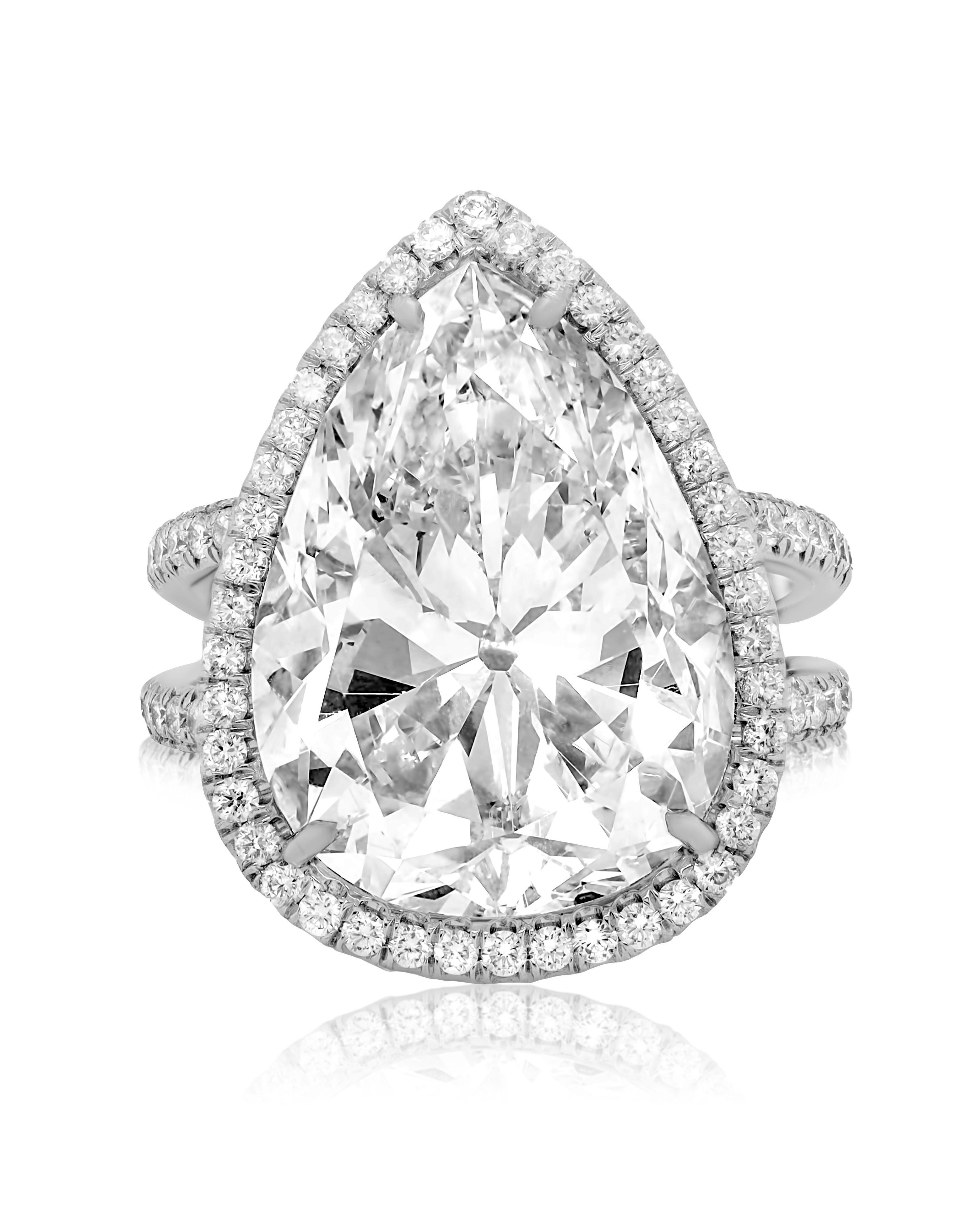 Platinum Diamond Ring with Pear Shape Diamond Center In New Condition In New York, NY