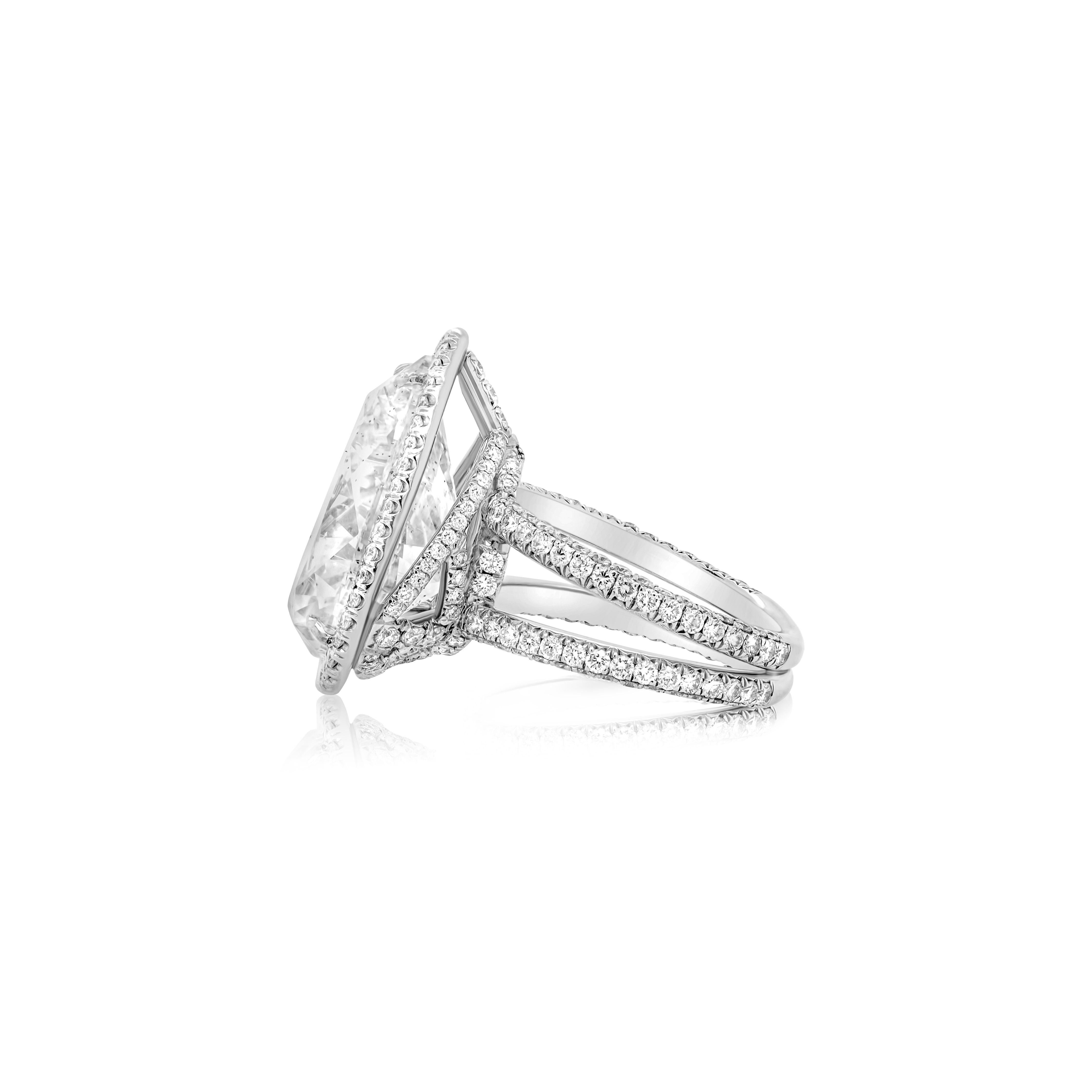 Women's Platinum Diamond Ring with Pear Shape Diamond Center