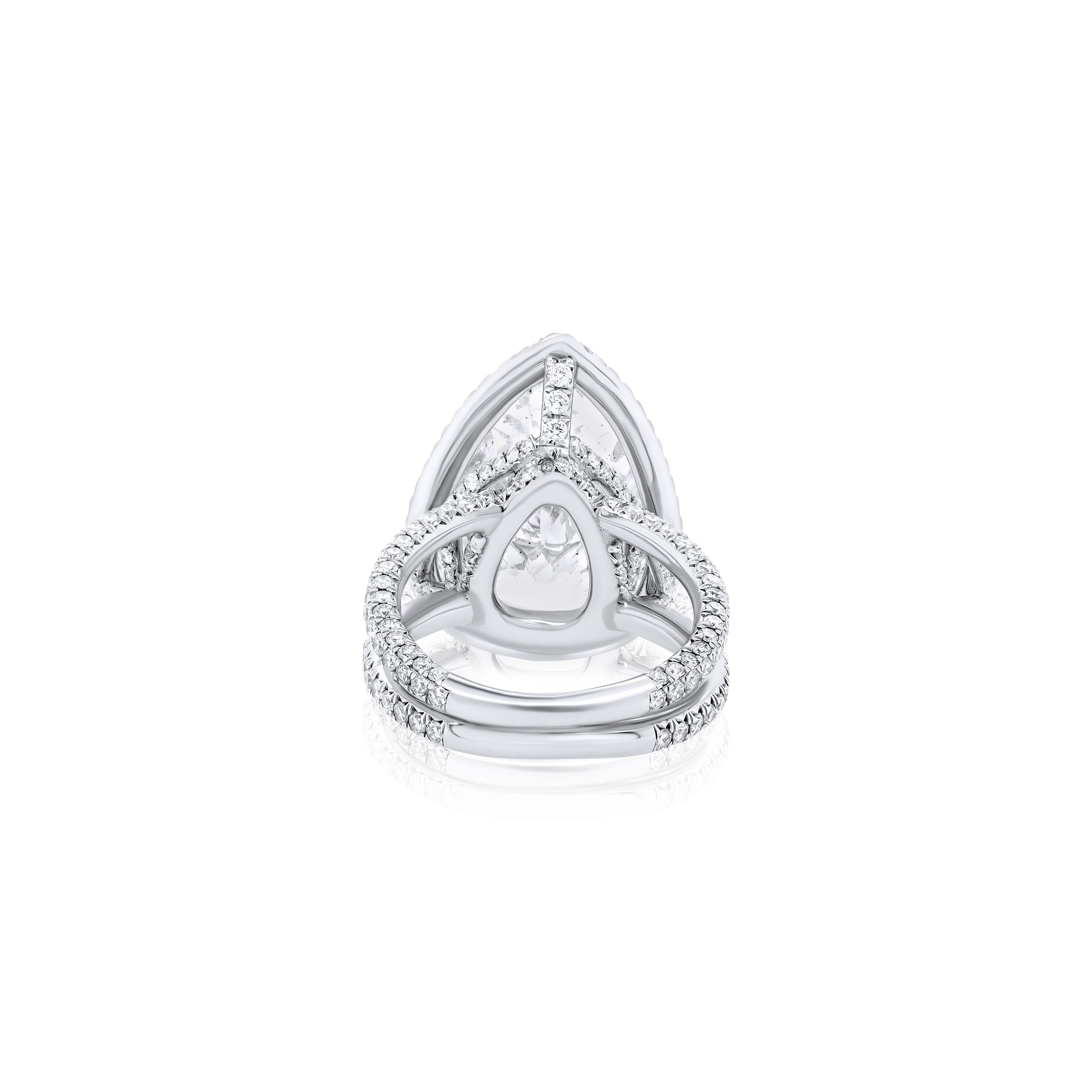 Platinum Diamond Ring with Pear Shape Diamond Center 1