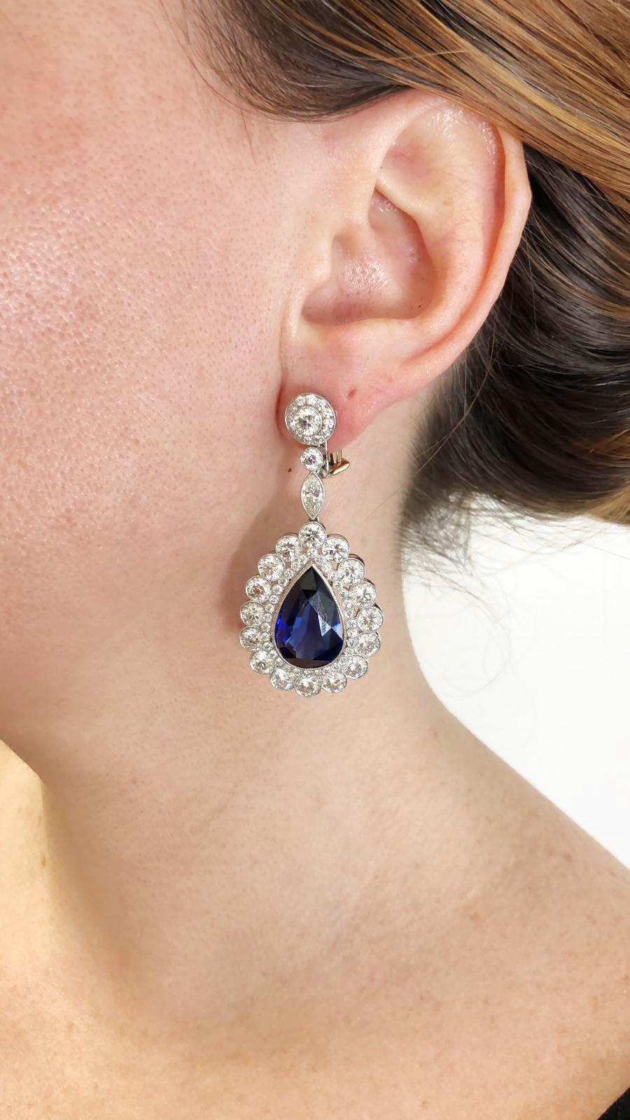 Modern diamond and pear shaped sapphire drop earrings, mounted in platinum.
sapphire weighing approx. 24.12 cts. 
diamonds weighing approx. 12.46 cts.