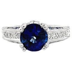 Anello con diamante e zaffiro in platino con incisione a mano