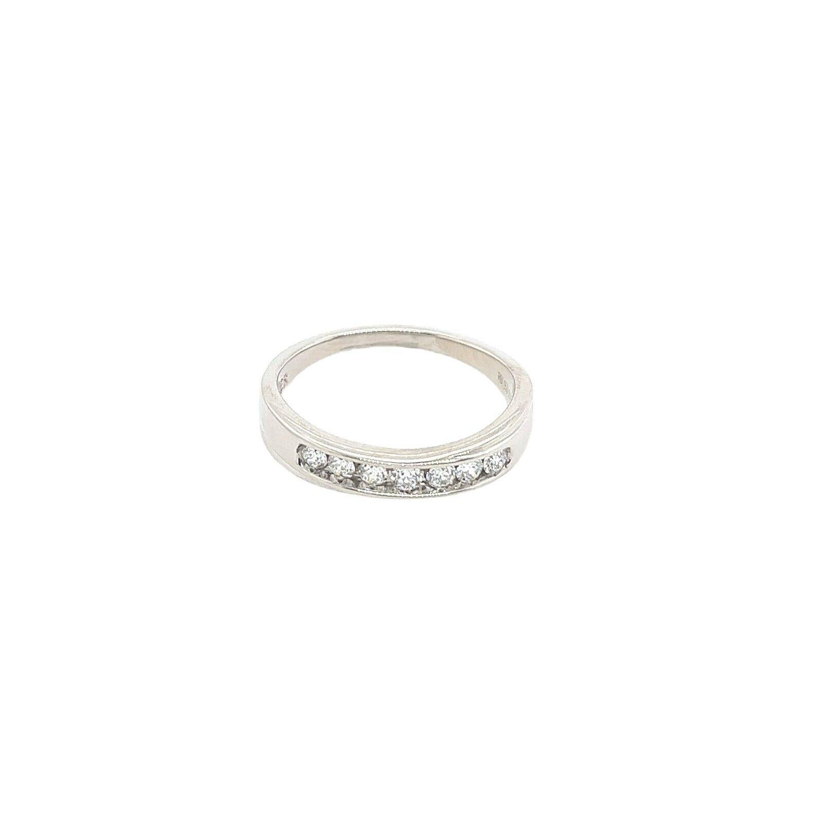 This Platinum Diamond half eternity band is set with 7 round brilliant cut Diamonds, in total 0.28ct of Diamonds, with 