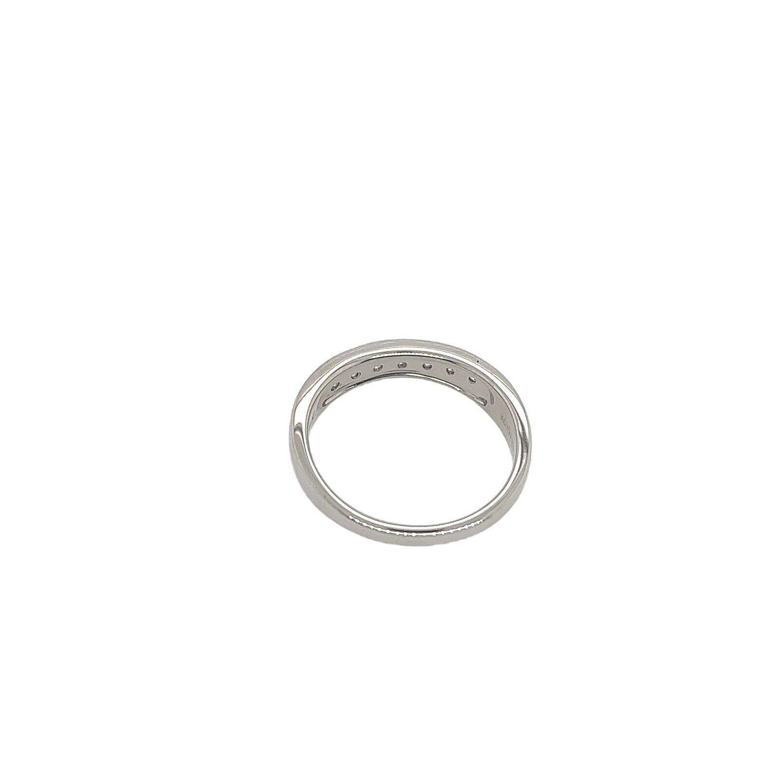 Round Cut Platinum Diamond Set Eternity/Wedding Ring with 7 Diamonds For Sale