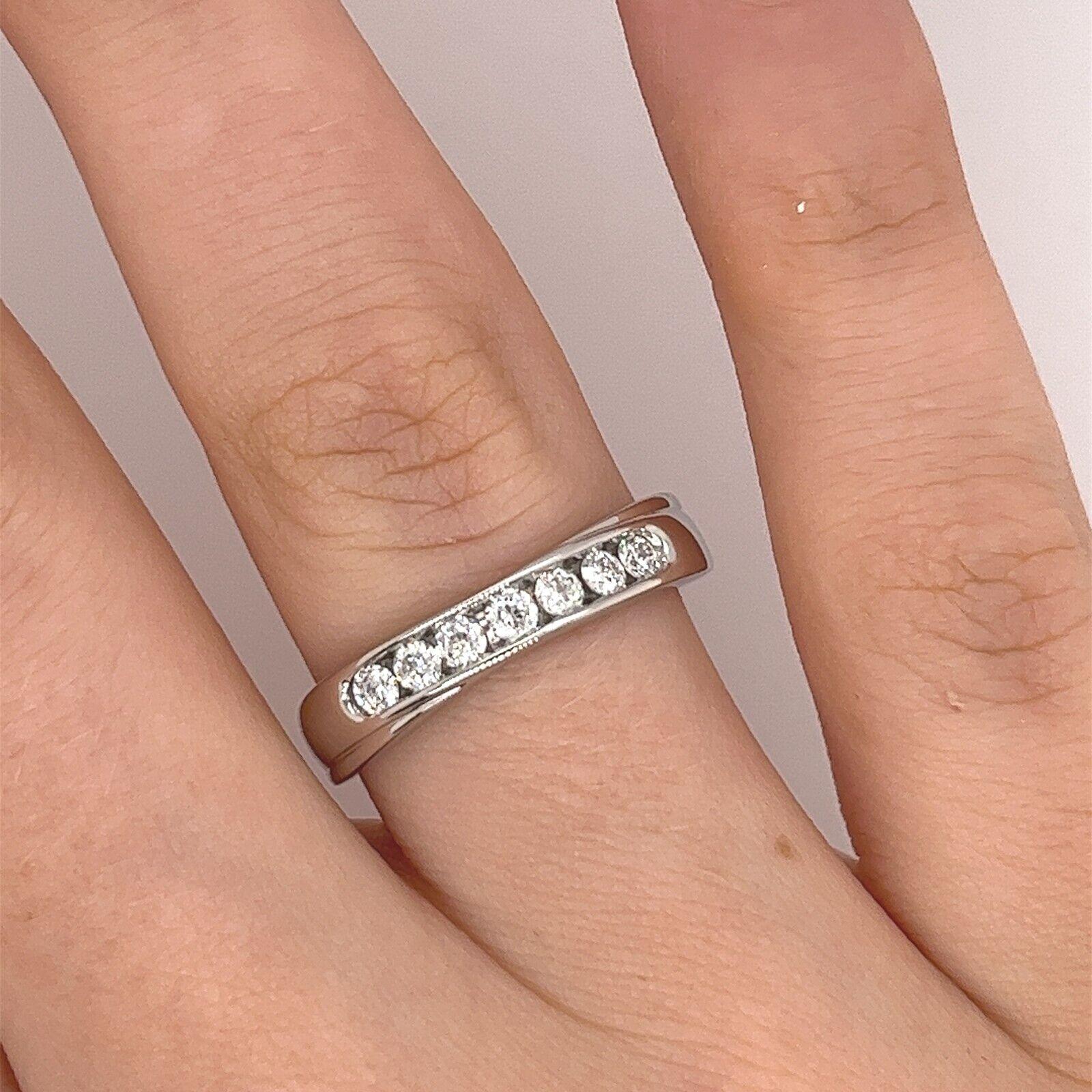 Women's Platinum Diamond Set Eternity/Wedding Ring with 7 Diamonds For Sale