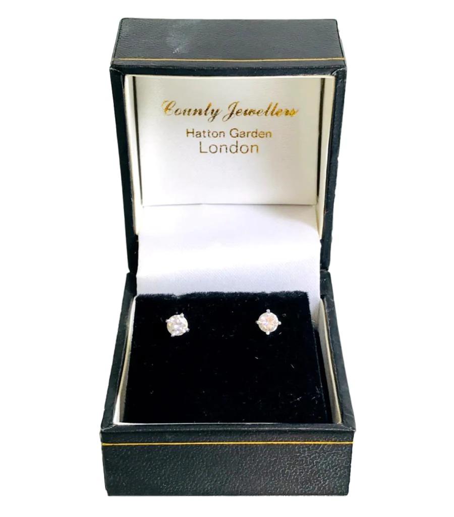 Platinum Diamond Solitaire Earrings For Sale 3