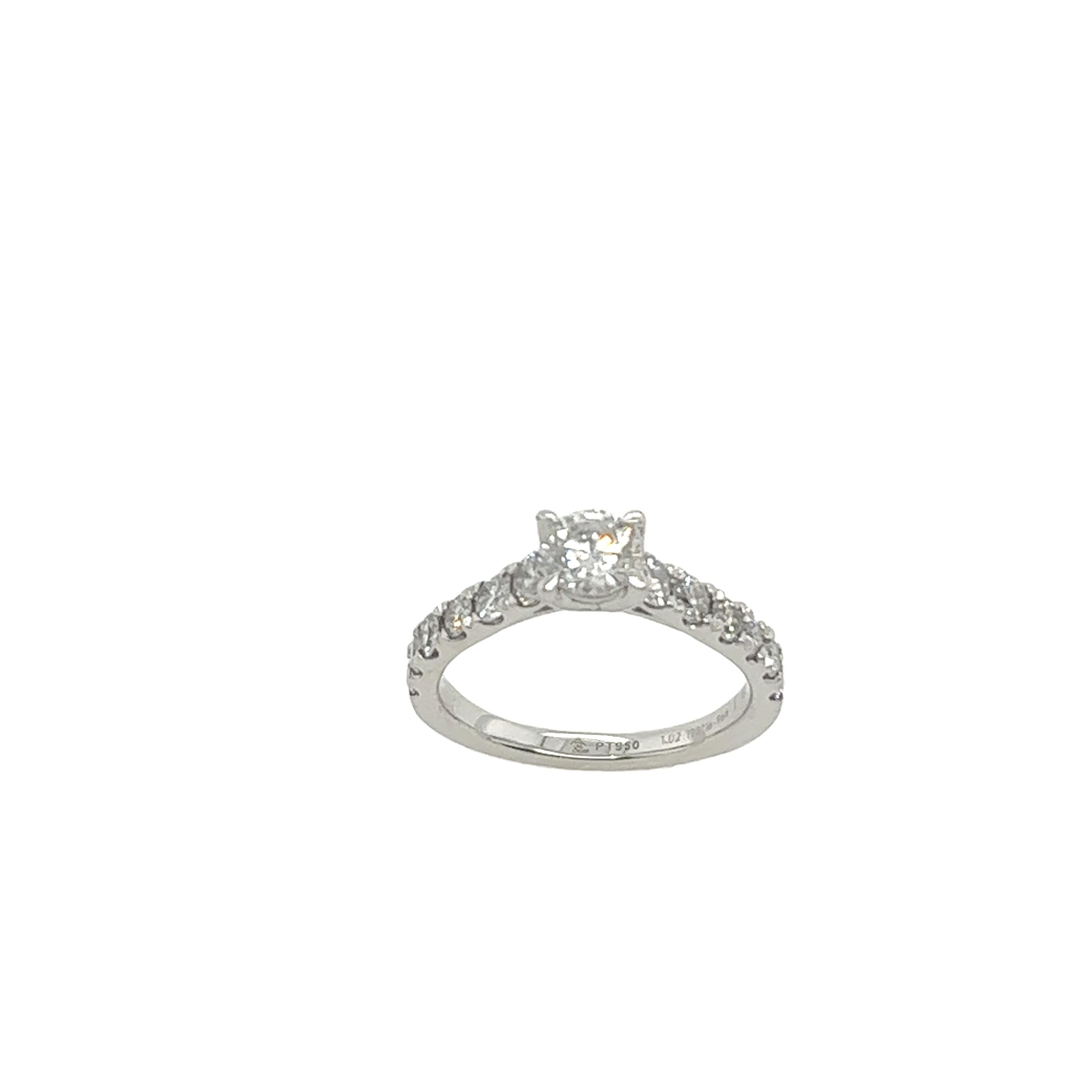 This engagement ring radiates brilliance and charm. Platinum masterpiece set with 0.40ct round brilliant cut diamond set with 12 small round brilliant cut diamonds, 0.62ct.
Total Diamond Weight: 0.40ct & 0.62ct
Diamond Colour: G
Diamond Clarity: