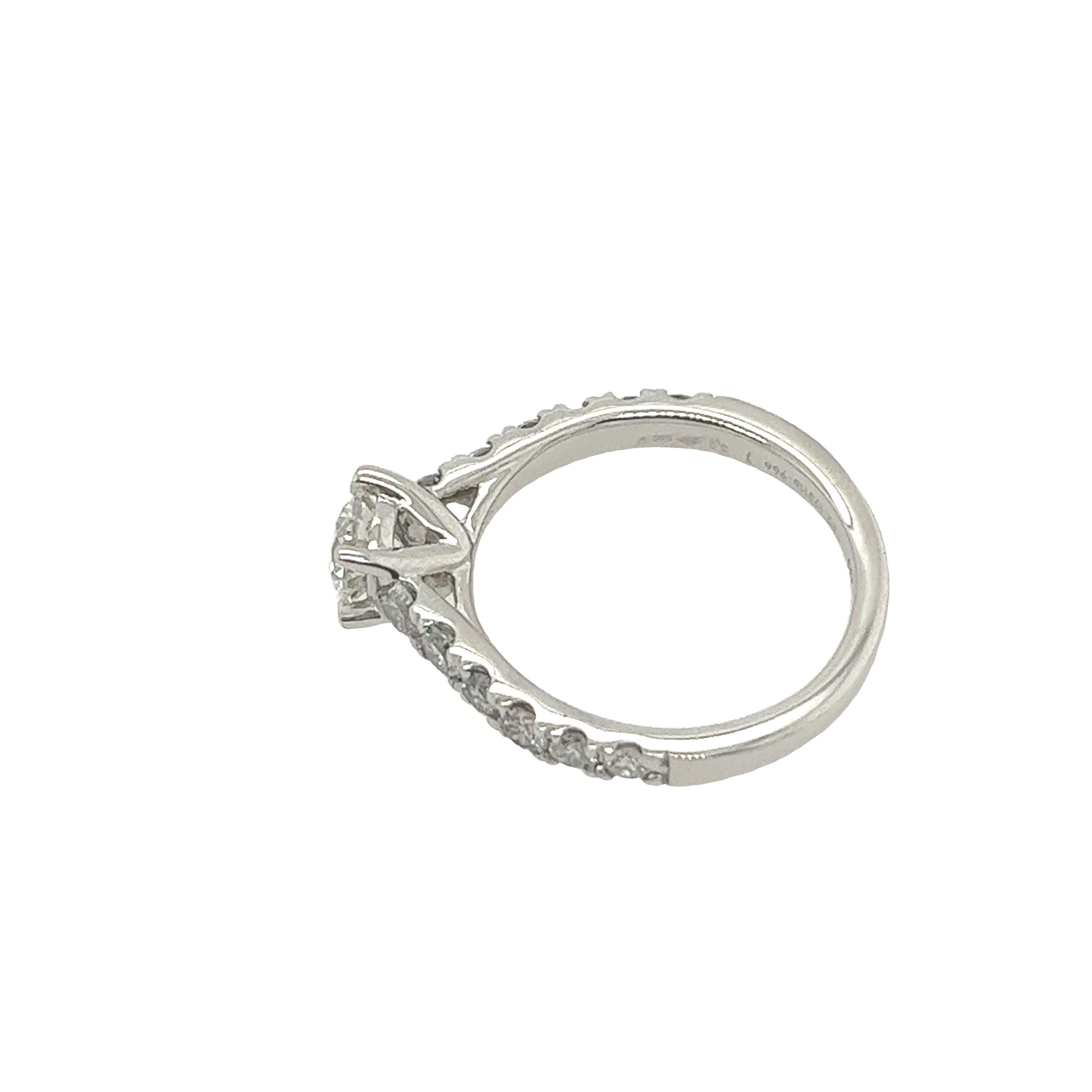 Platinum Diamond Solitaire Ring Set With 0.40ct Round Diamond & 0.62ct On Sides For Sale 1